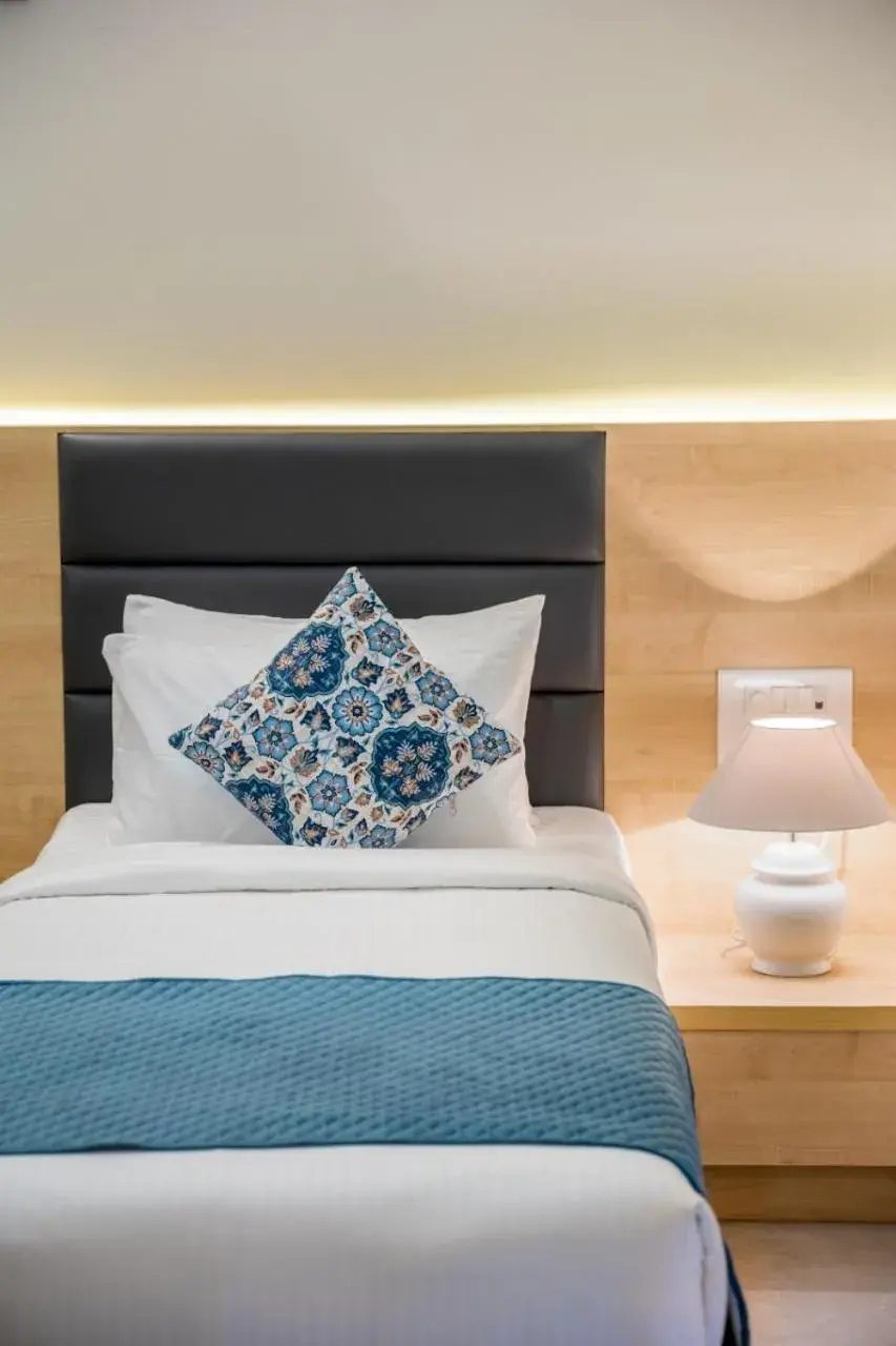 Bed in Iris Suites Bed in Iris Suites