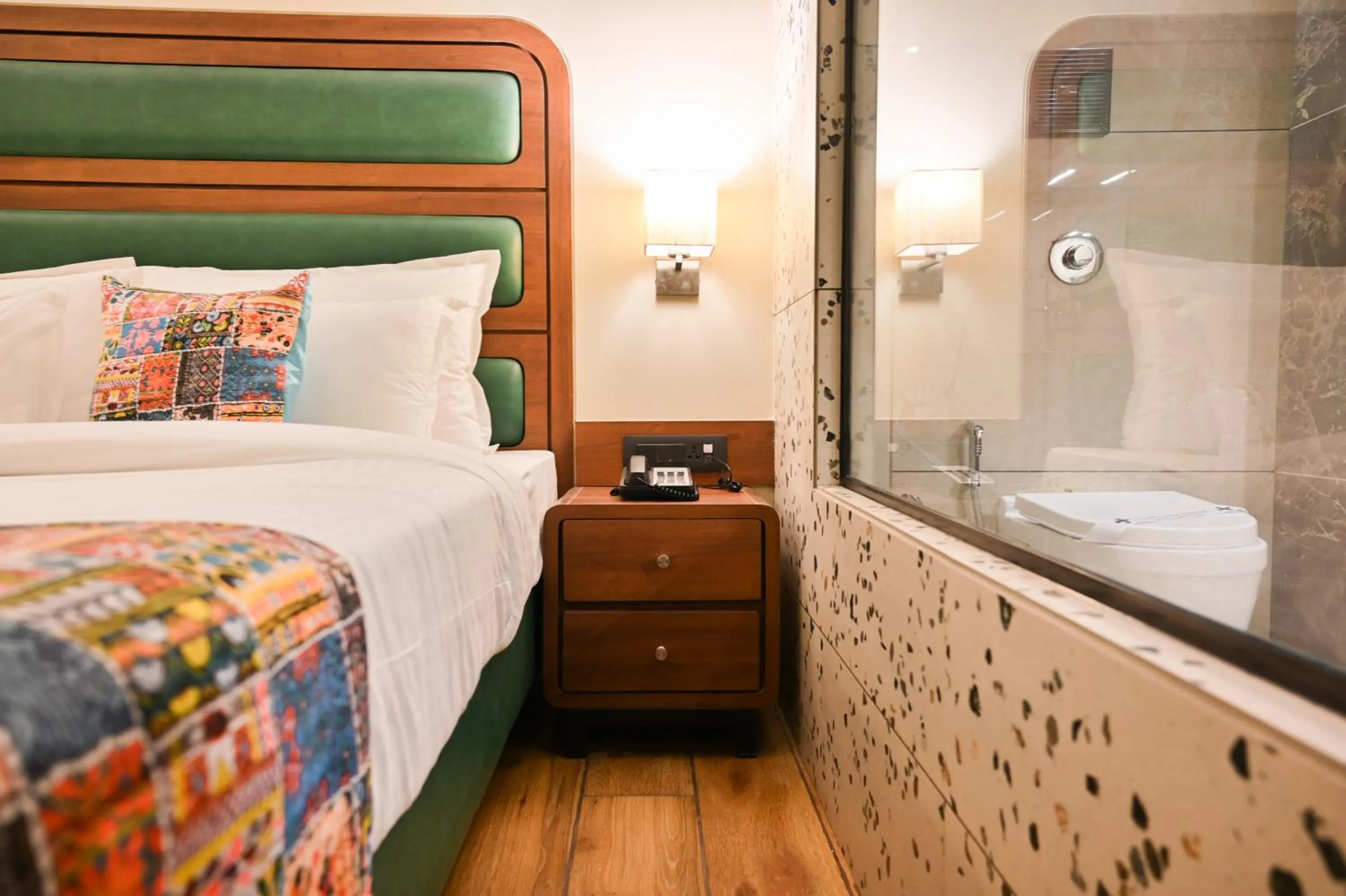 Bed in Suvidha Suites