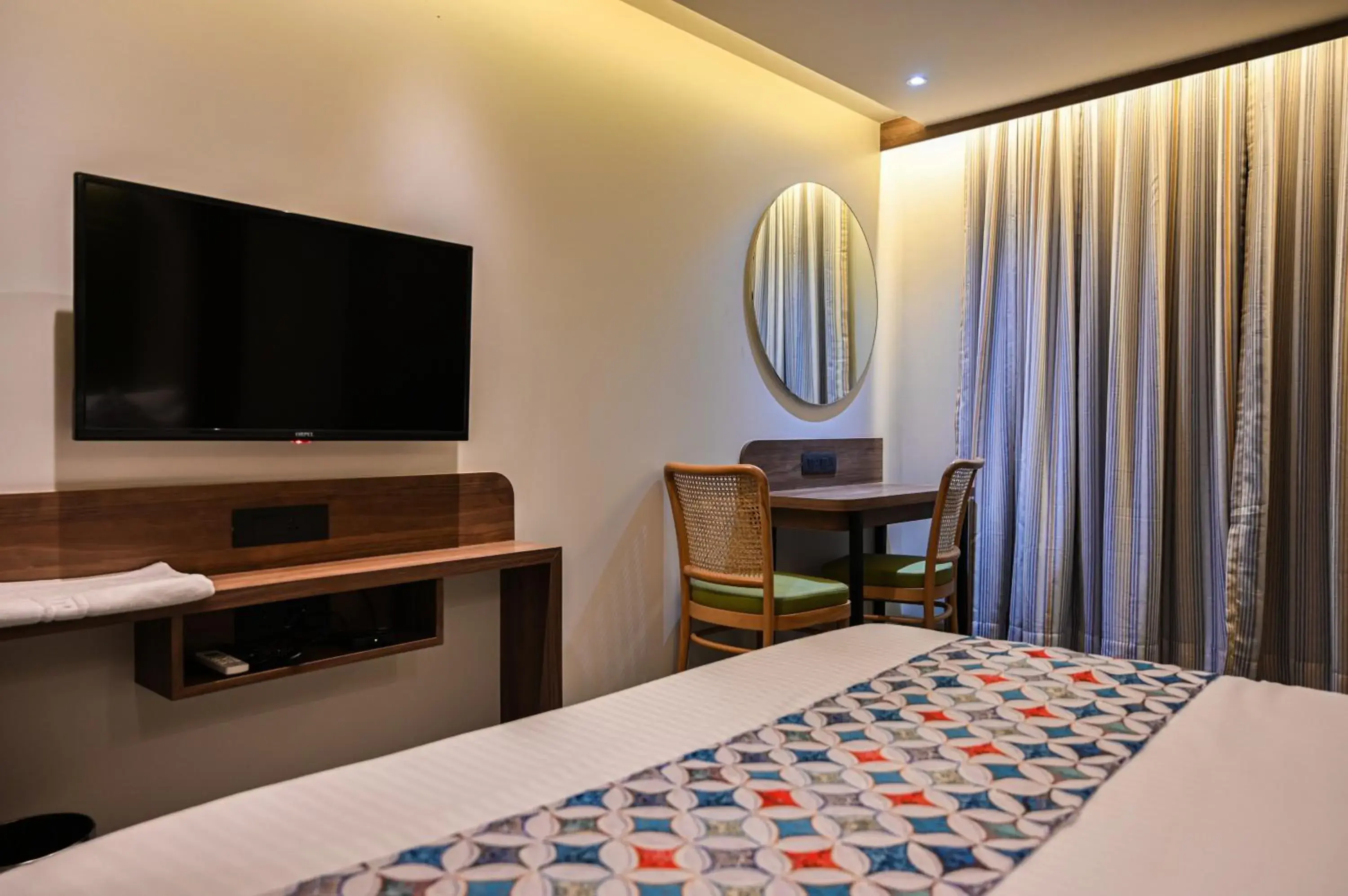 TV and multimedia, Bed in Suvidha Suites TV and multimedia, Bed in Suvidha Suites