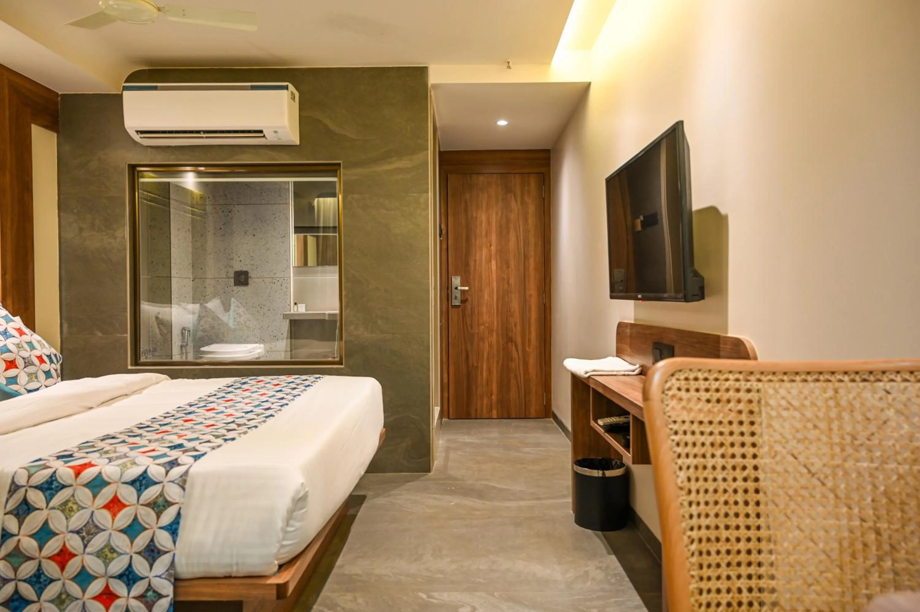 Photo of the whole room, Bed in Suvidha Suites