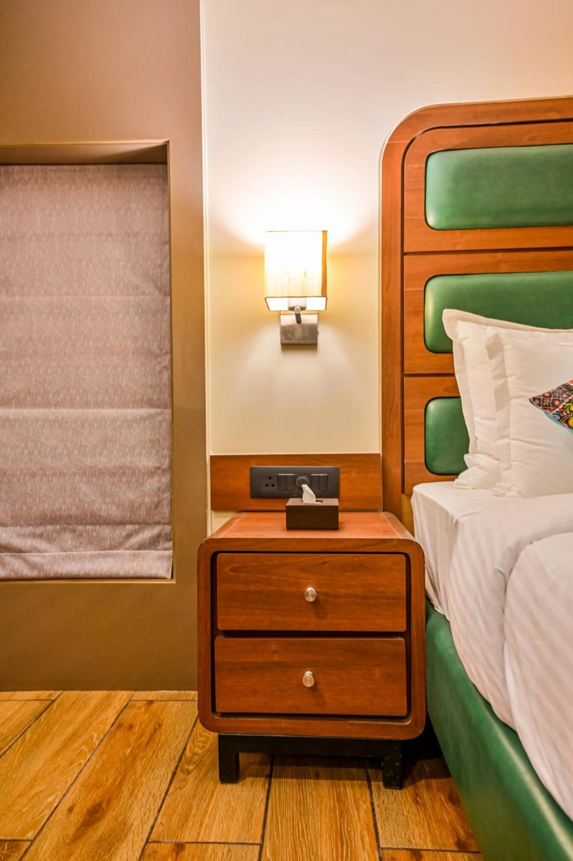 Bed in Suvidha Suites