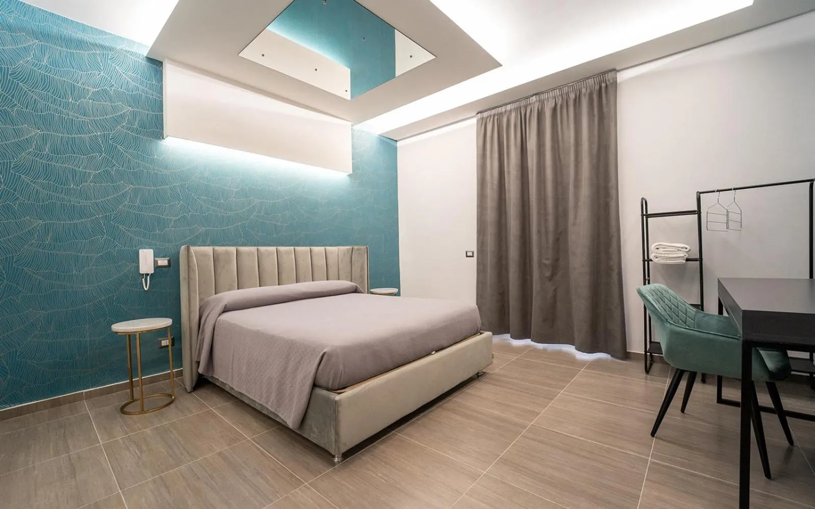 Bed in Intimity Luxury Rooms