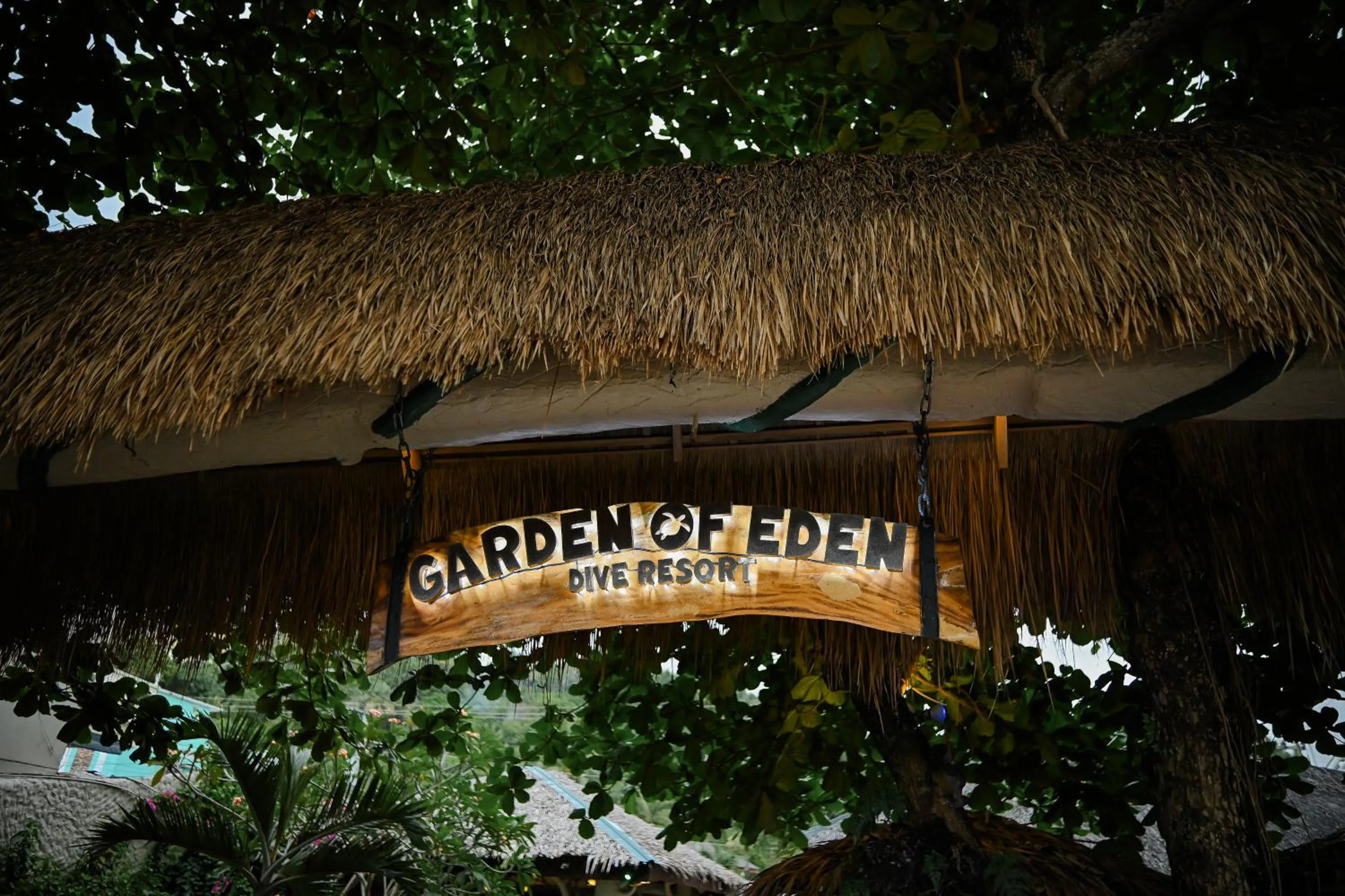 Property logo or sign in Garden of Eden Dive Resort