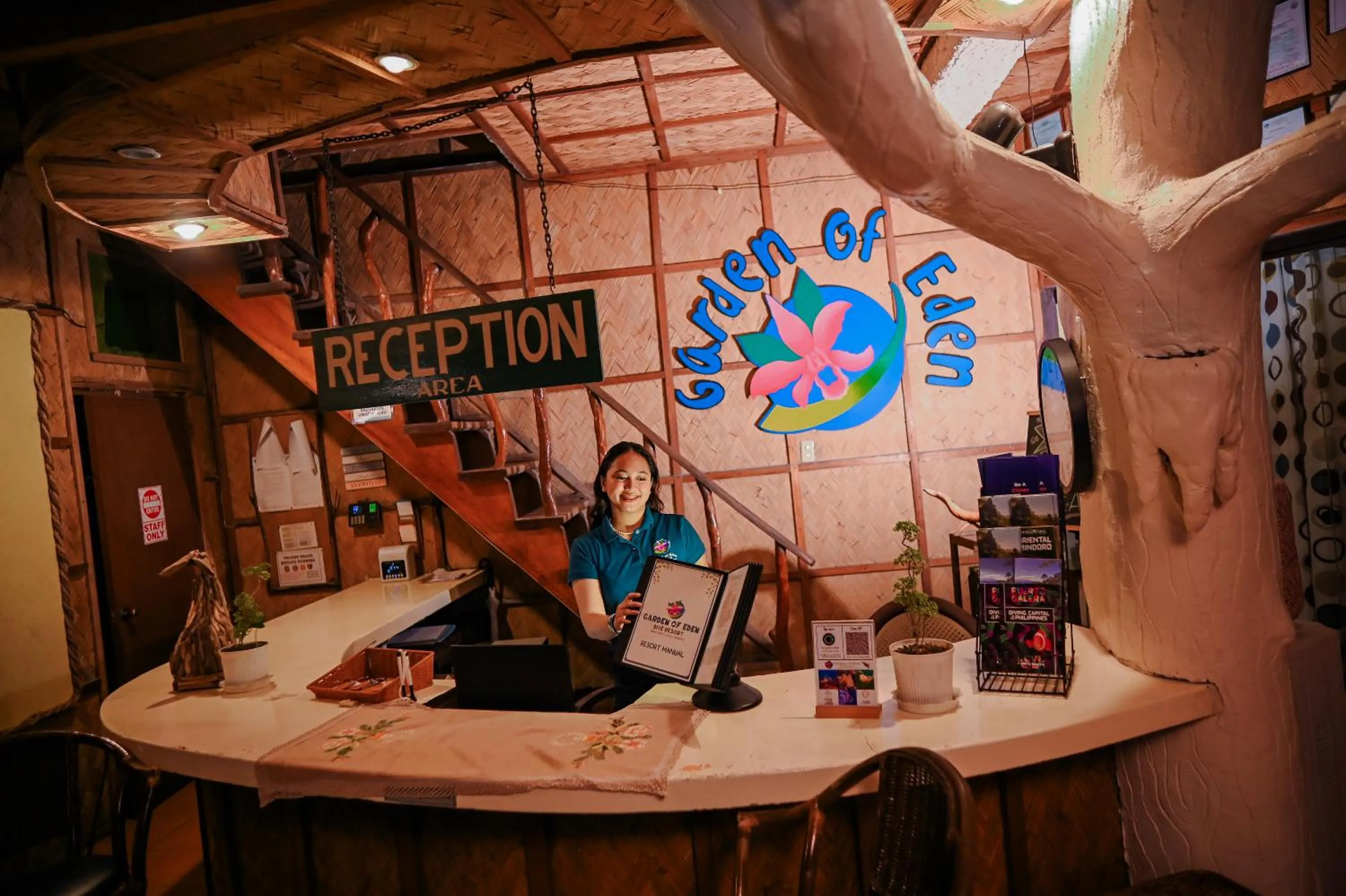 Property logo or sign in Garden of Eden Dive Resort