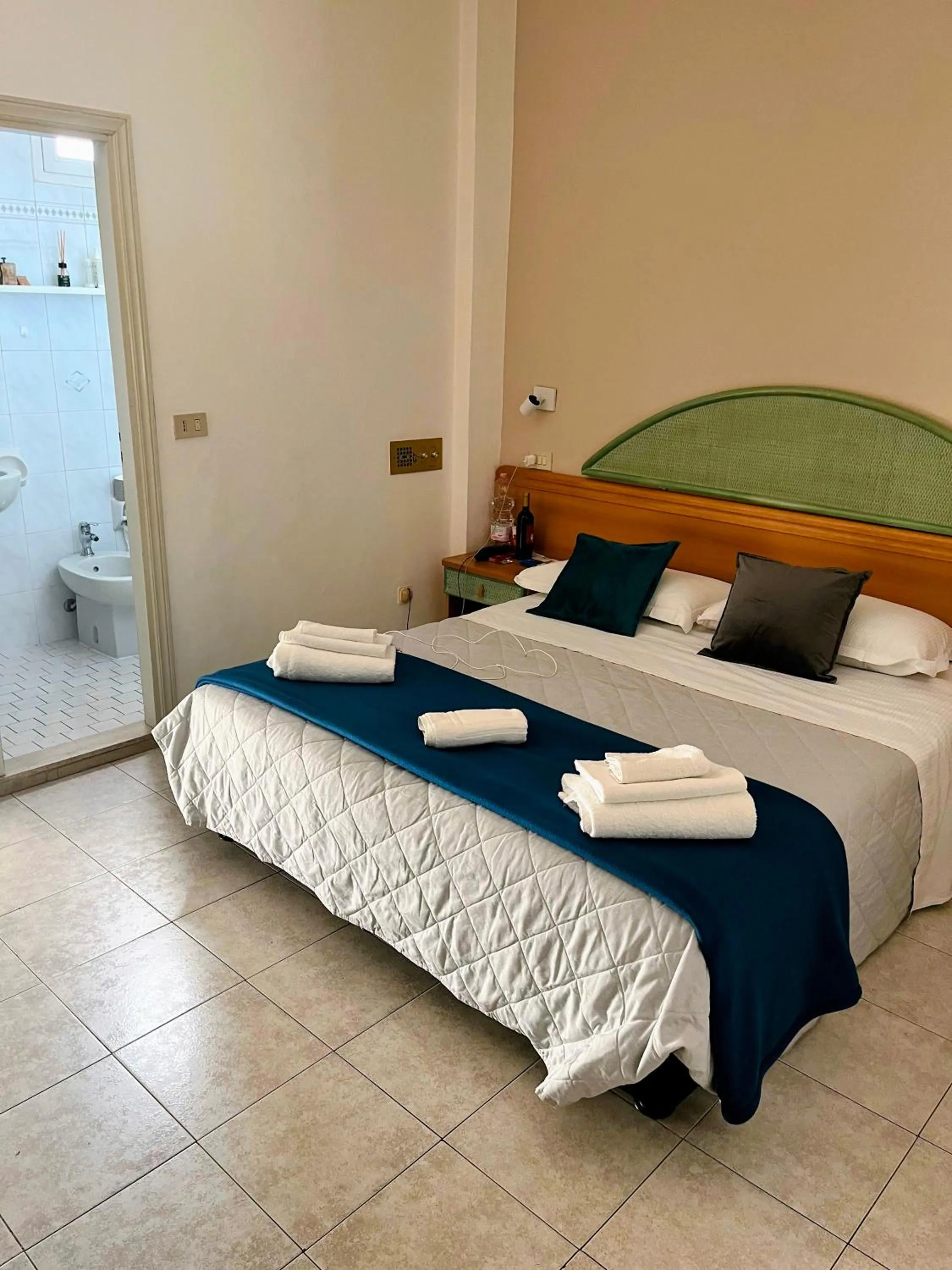 Photo of the whole room, Bed in Aura Living Hotel