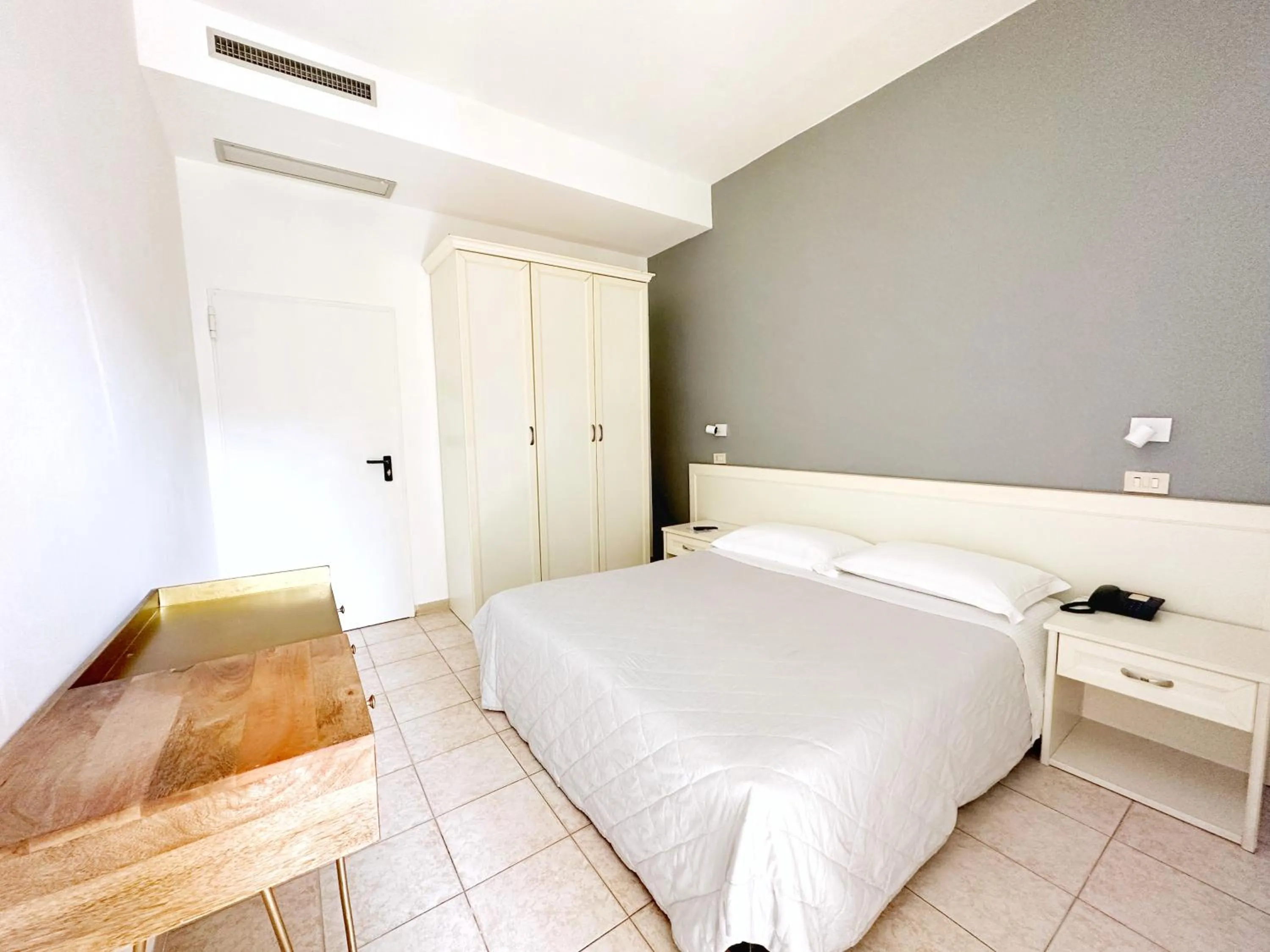 Bed in Aura Living Hotel