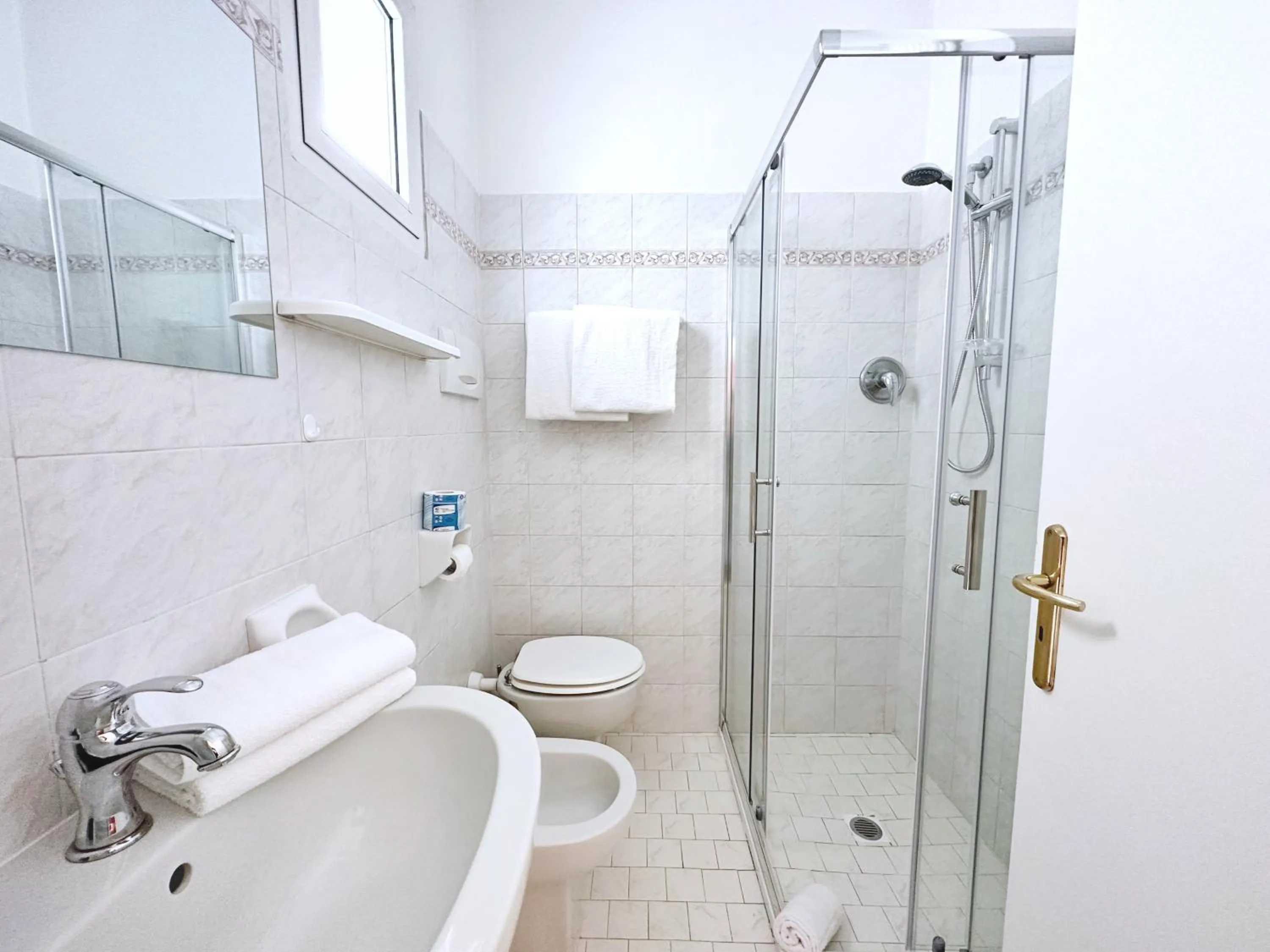 Shower in Aura Living Hotel