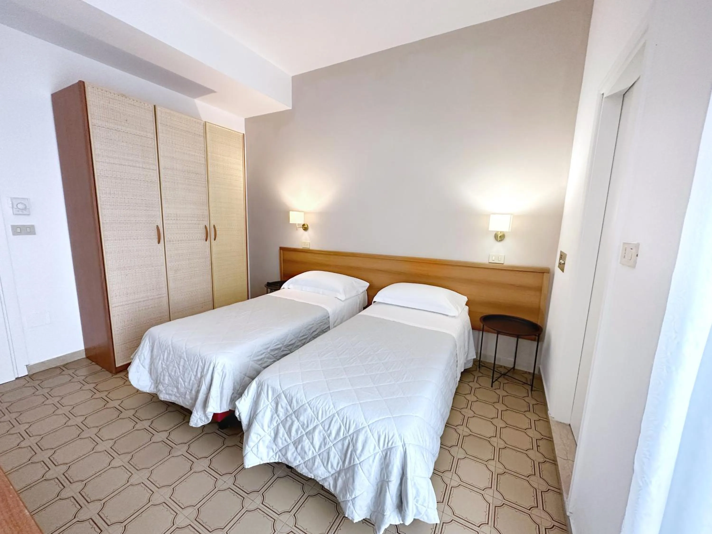 Photo of the whole room, Bed in Aura Living Hotel