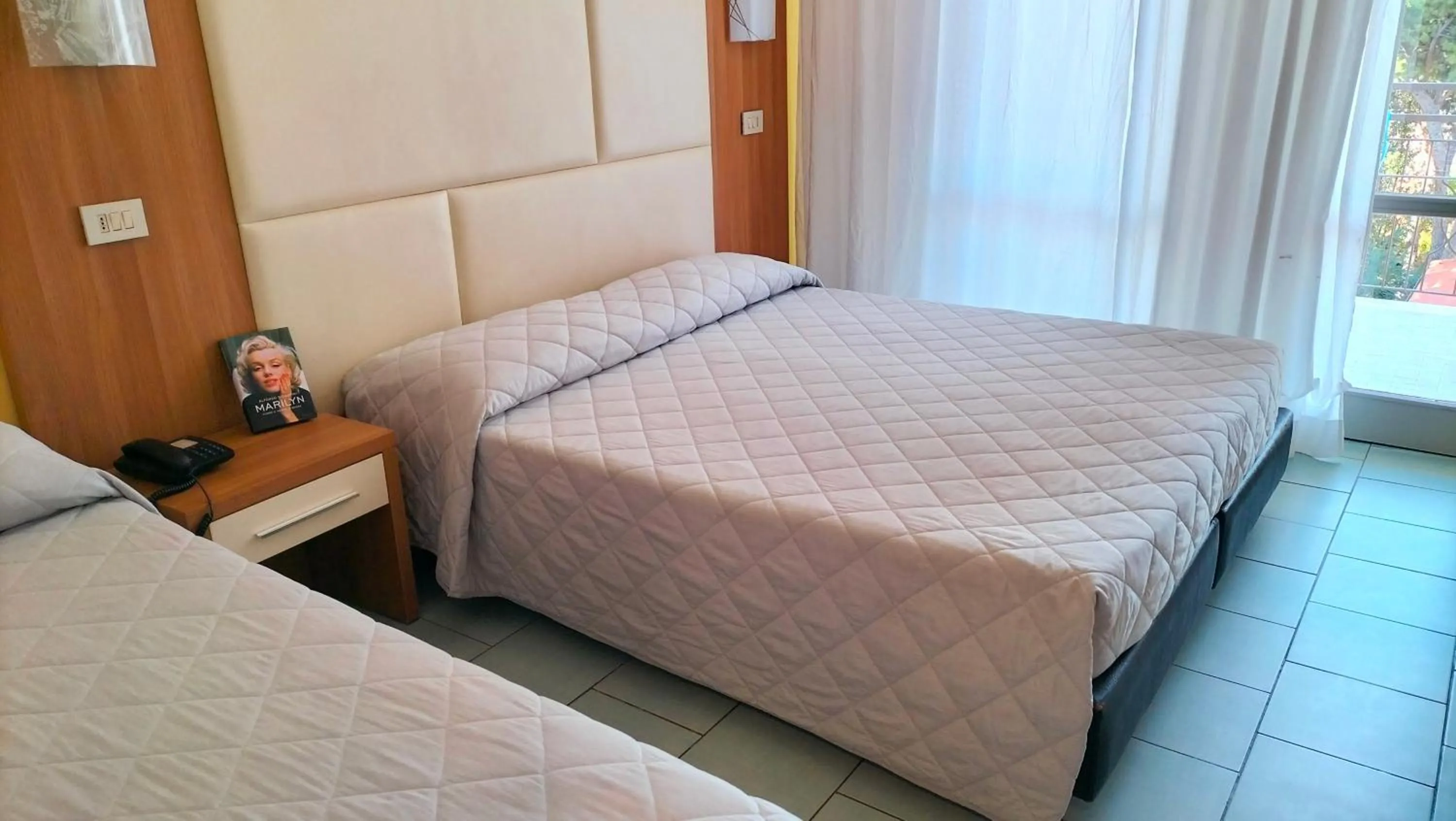 Photo of the whole room, Bed in Aura Living Hotel