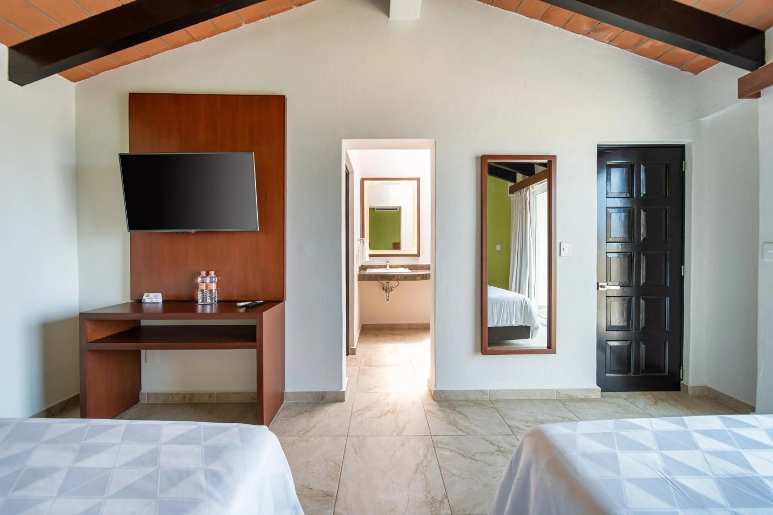 Bedroom, Bed in Villas Coral Huatulco