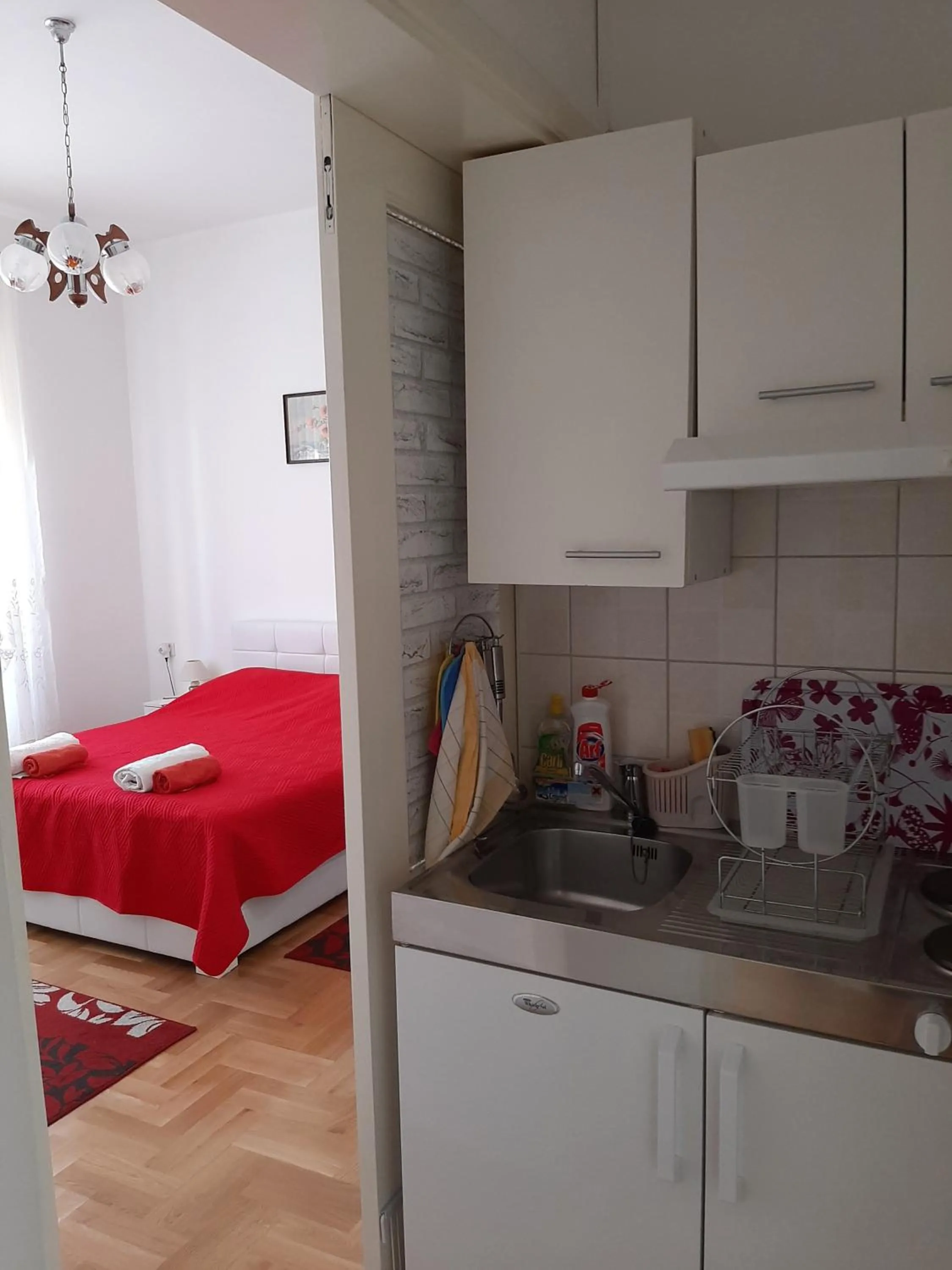Kitchen or kitchenette, Bed in Rooms&Studios Rina