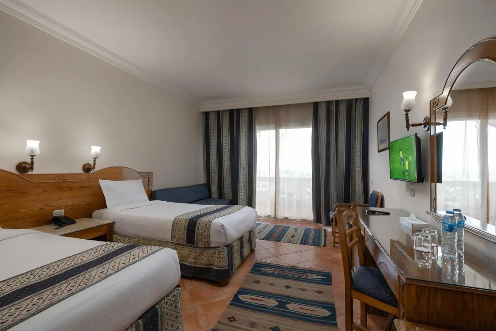 Photo of the whole room, Bed in Bliss Nada Beach Resort Photo of the whole room, Bed in Bliss Nada Beach Resort