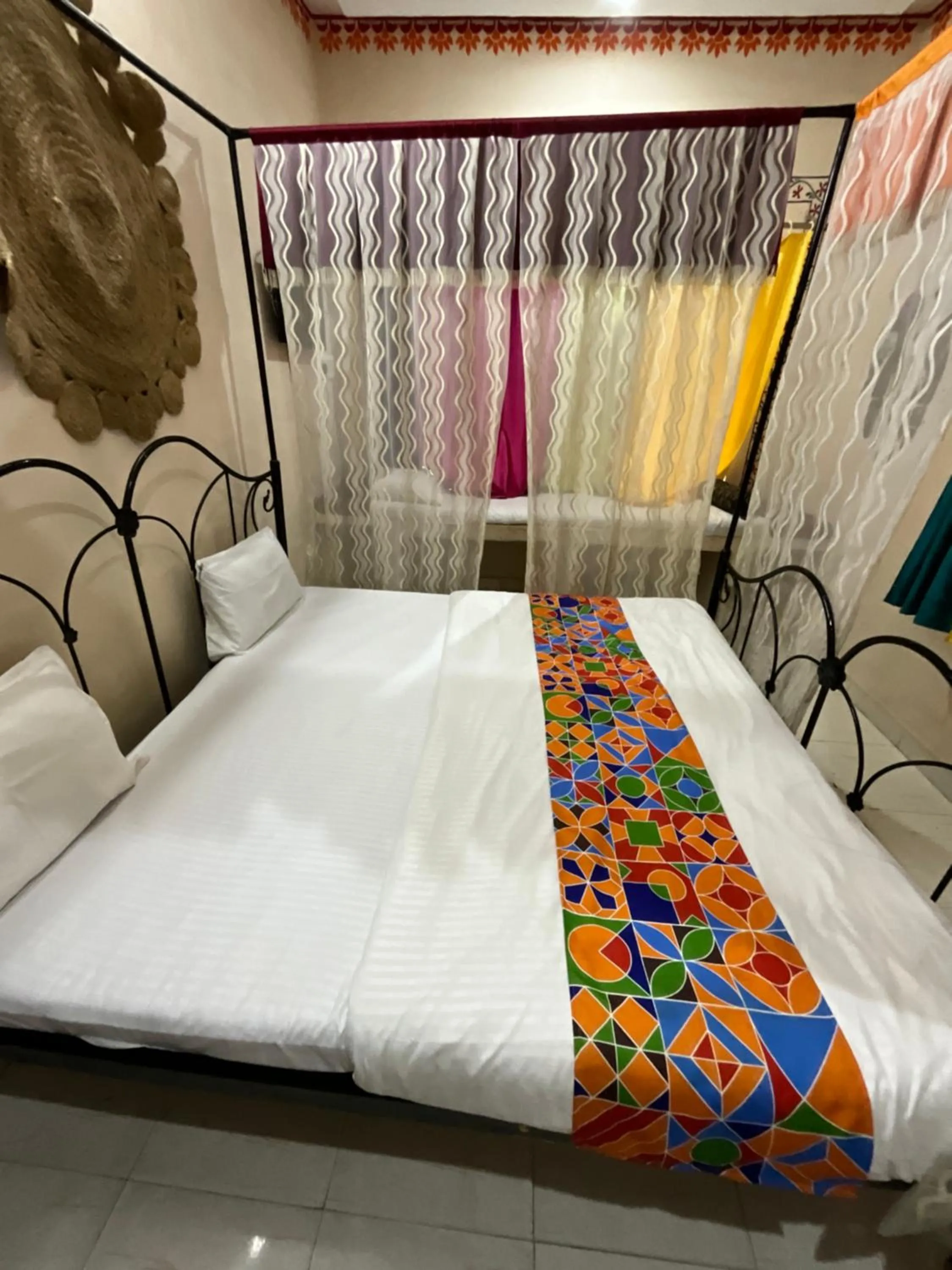 Bed in HOTEL HANUMAN GHAT On LAKE PICHOLA