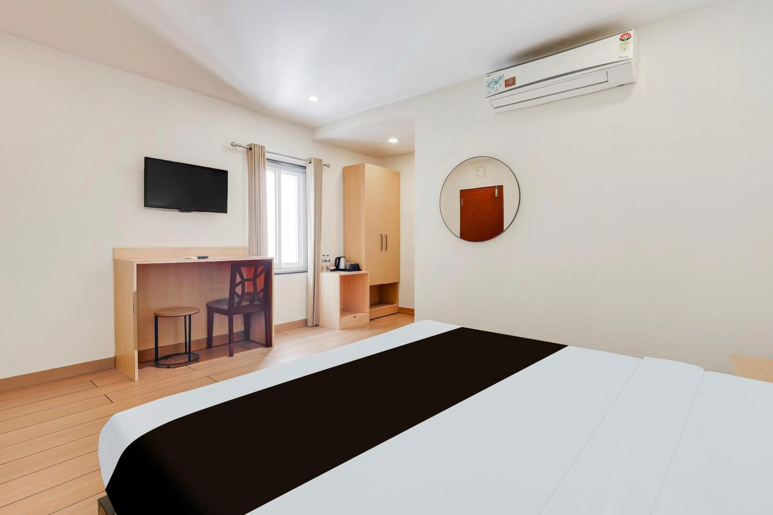 Bedroom, Bed in Super Townhouse Visakhapatnam