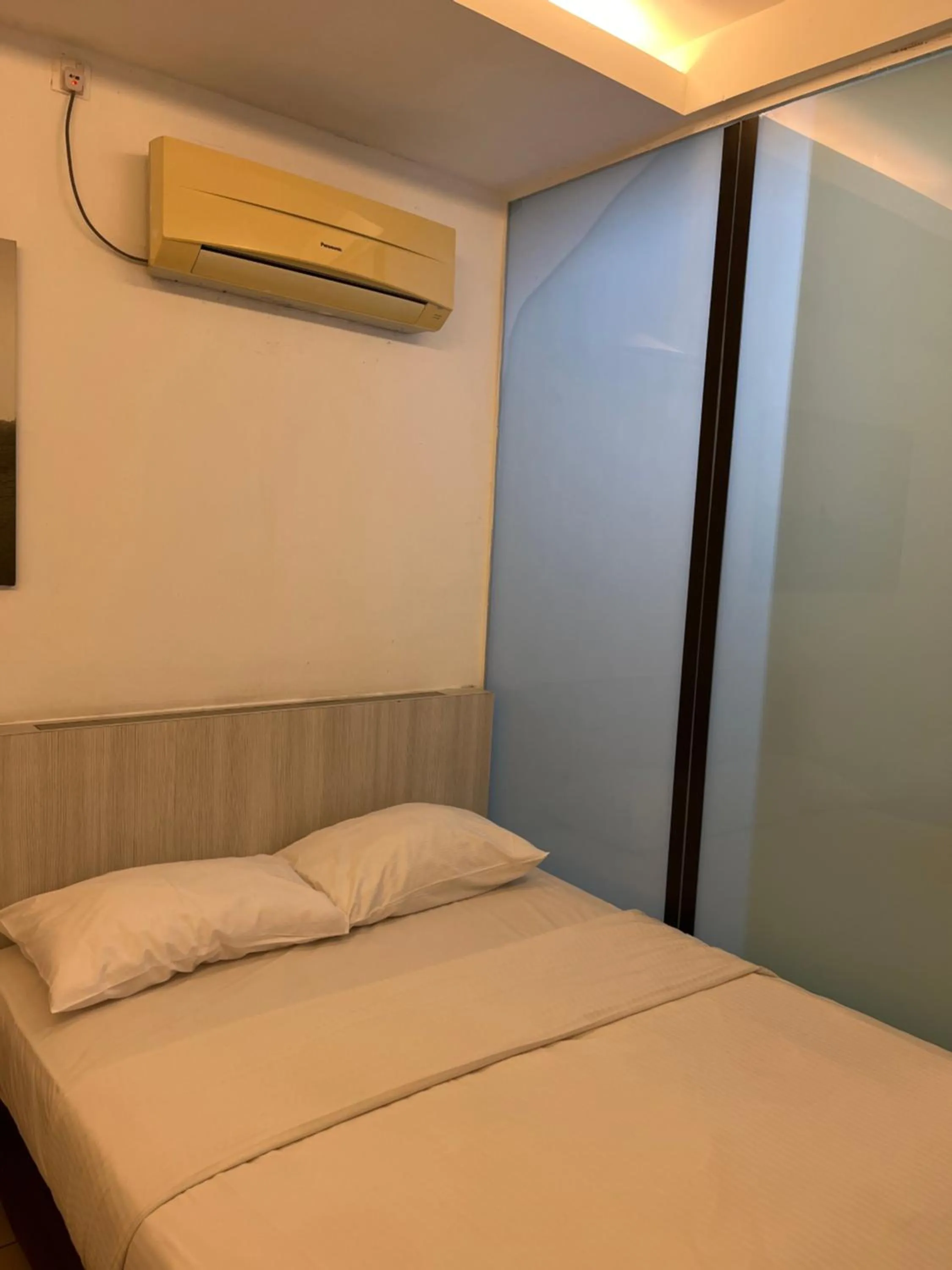 Bed in Coastline Hotel