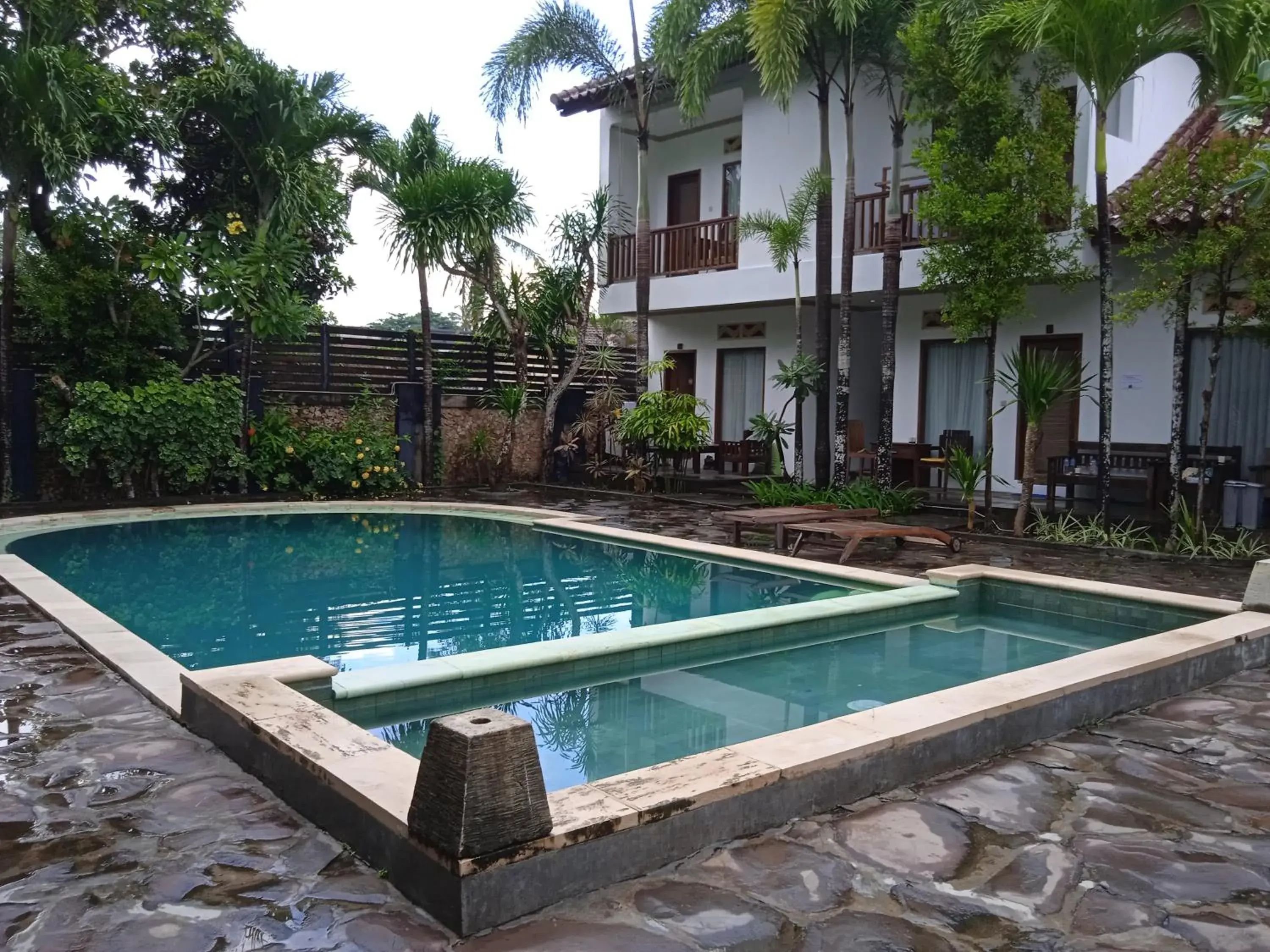 Property building in family house hotel kuta Property building in family house hotel kuta