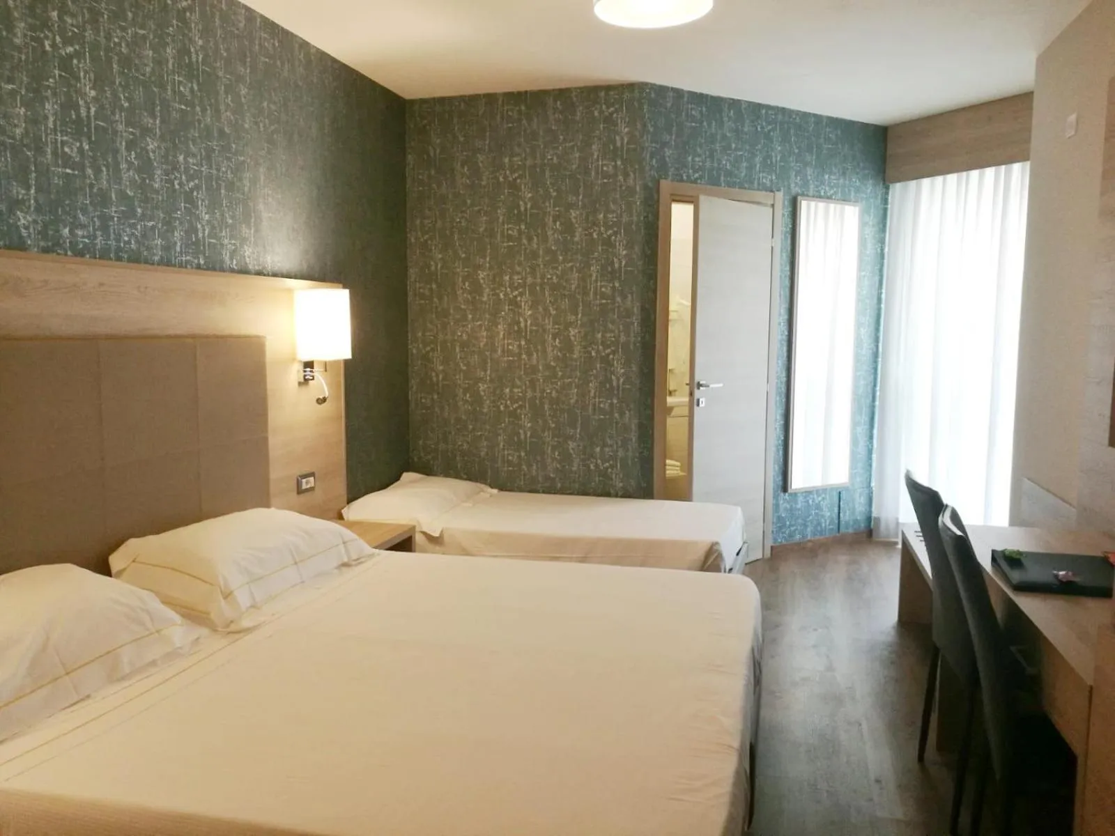 Photo of the whole room, Bed in Alma di Alghero Hotel