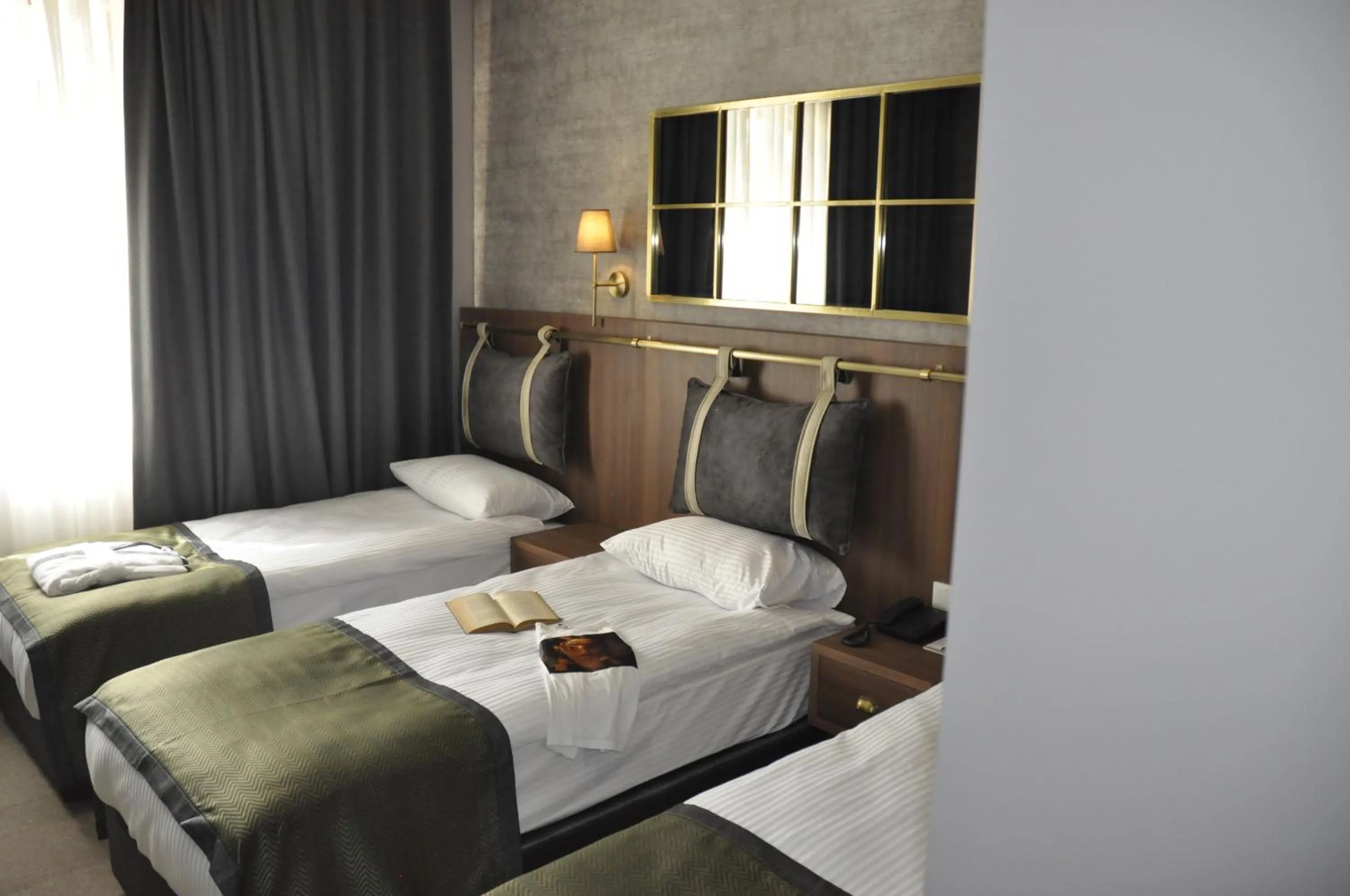 Bed in CONNECT THERMAL HOTEL