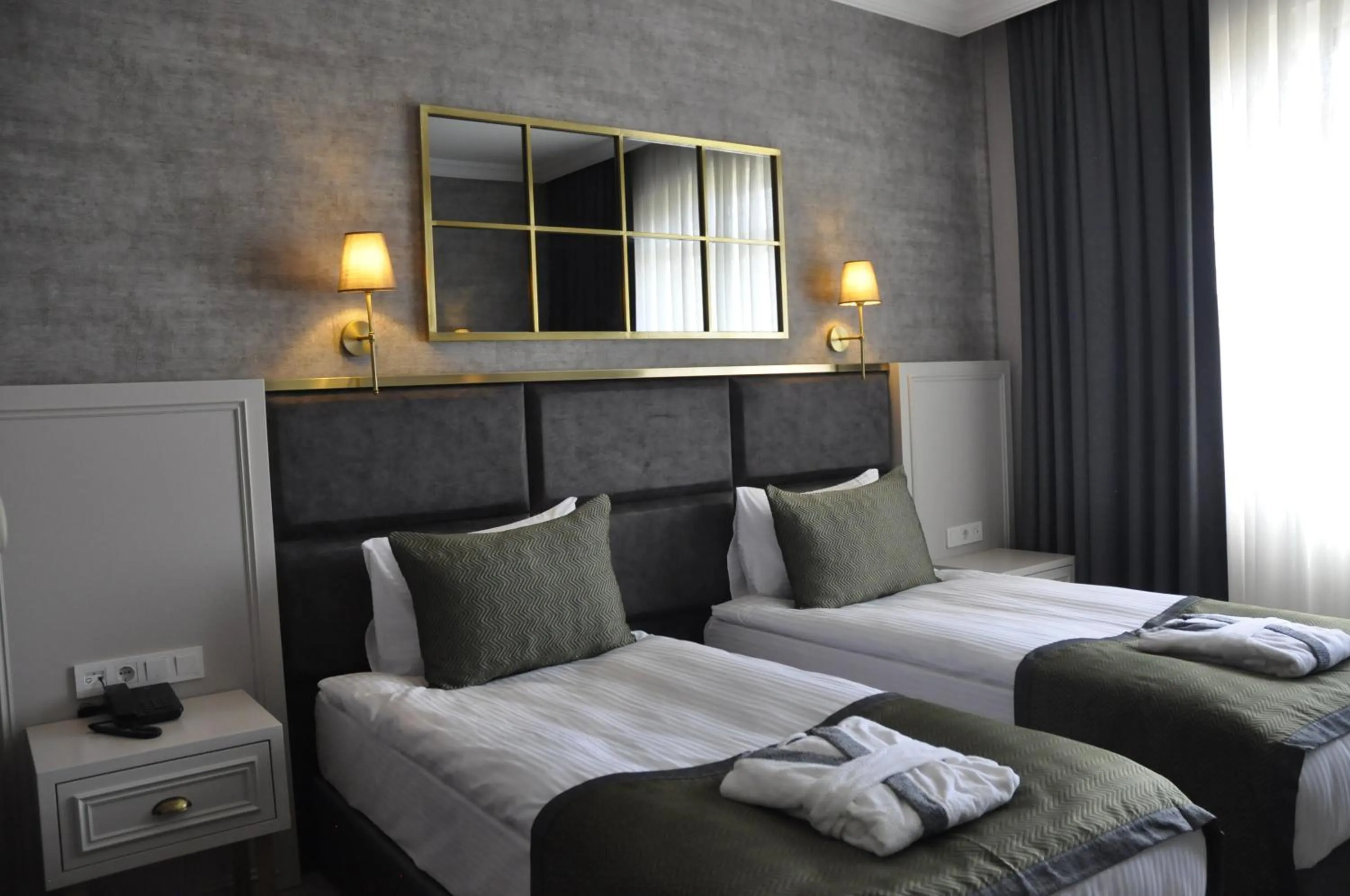 Bed in CONNECT THERMAL HOTEL