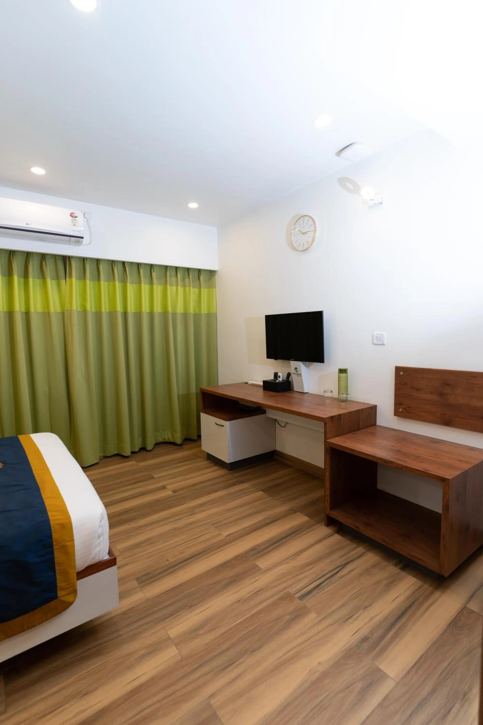 Photo of the whole room, Bed in Regal Suites