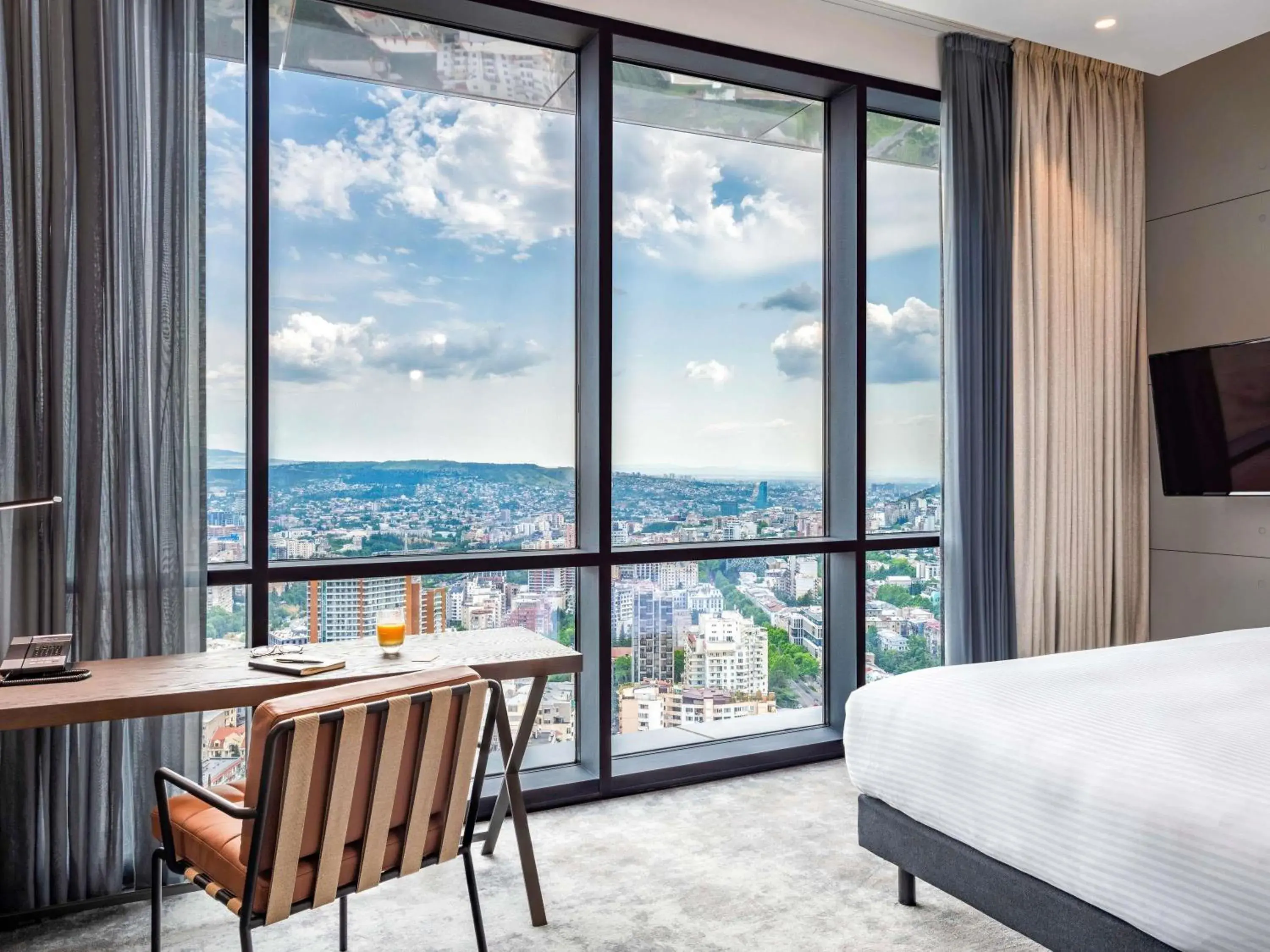 Property building, Bed in Pullman Tbilisi Axis Towers Property building, Bed in Pullman Tbilisi Axis Towers