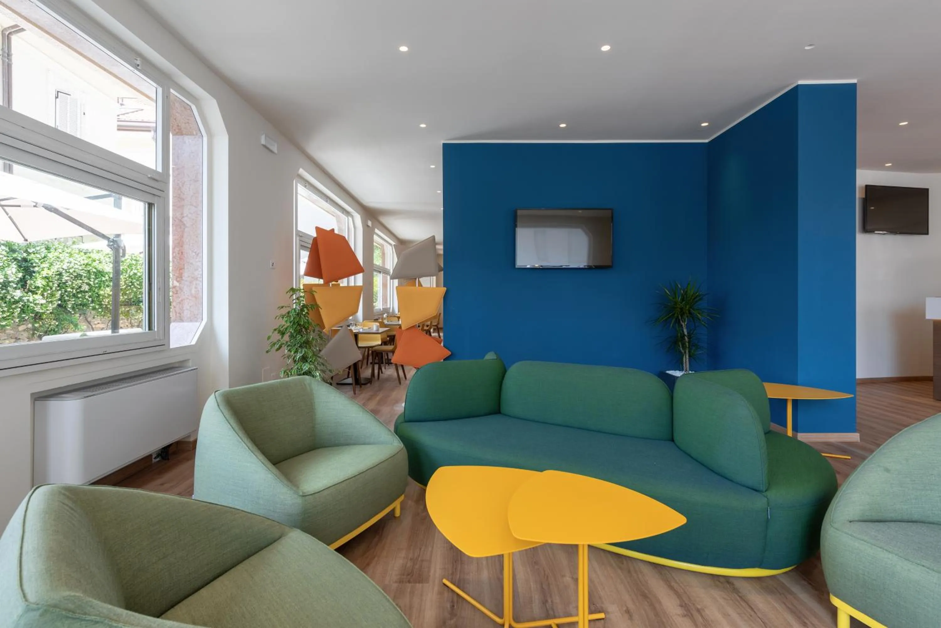 Communal lounge/ TV room in Hotel Riva