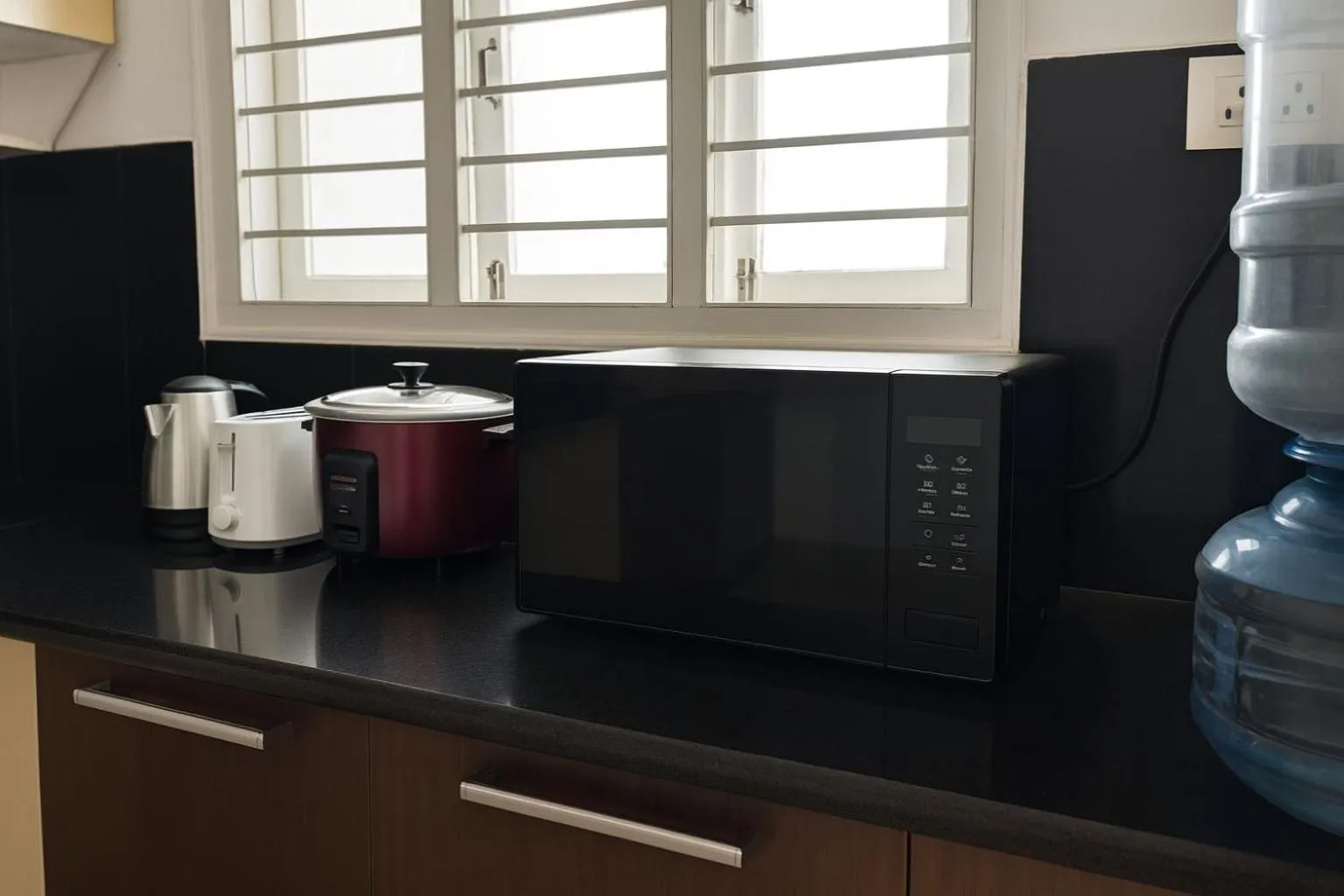 Kitchen or kitchenette in White Fern Stays Serviced Apartments - Gachibowli