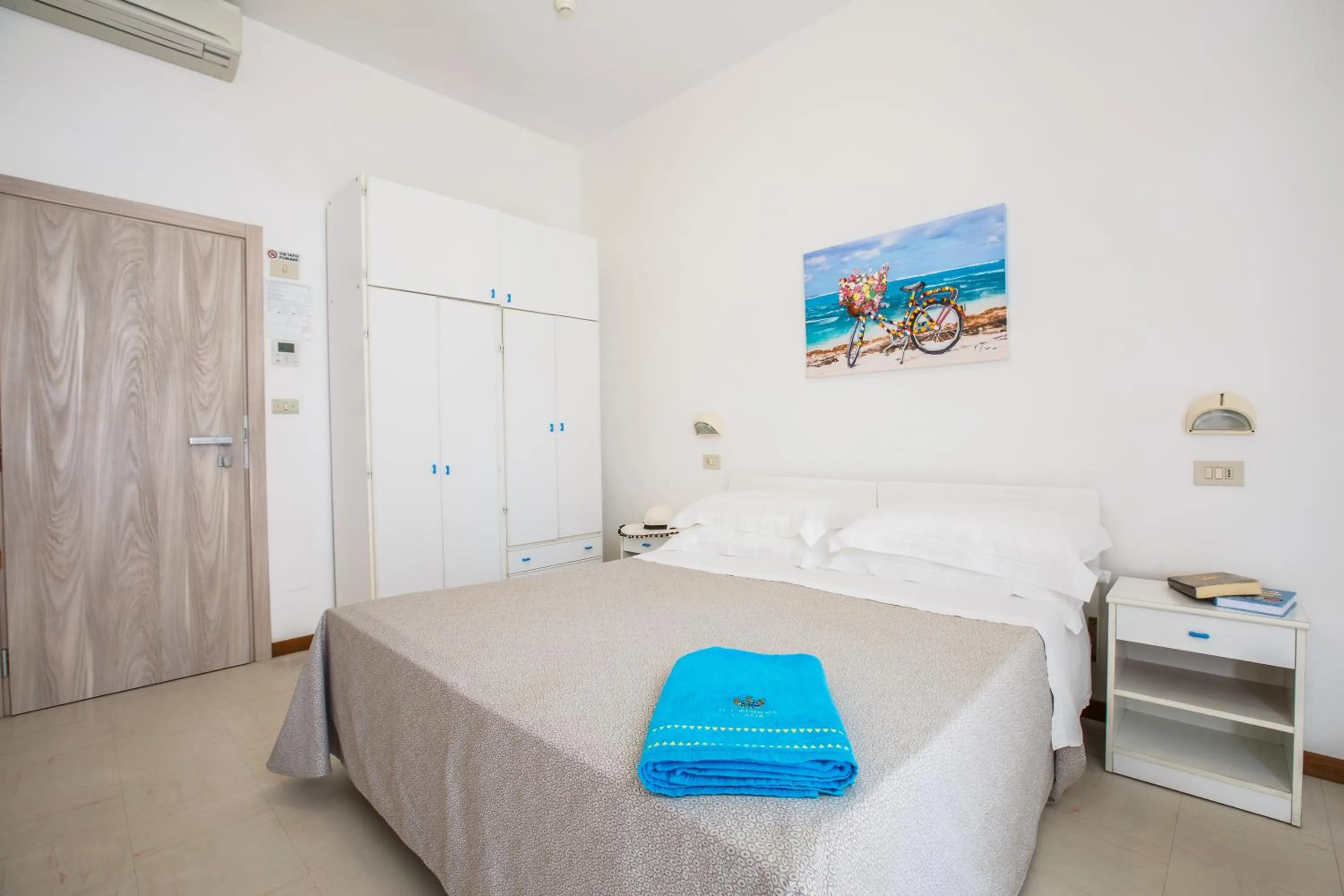 Bed in Hotel Capinera