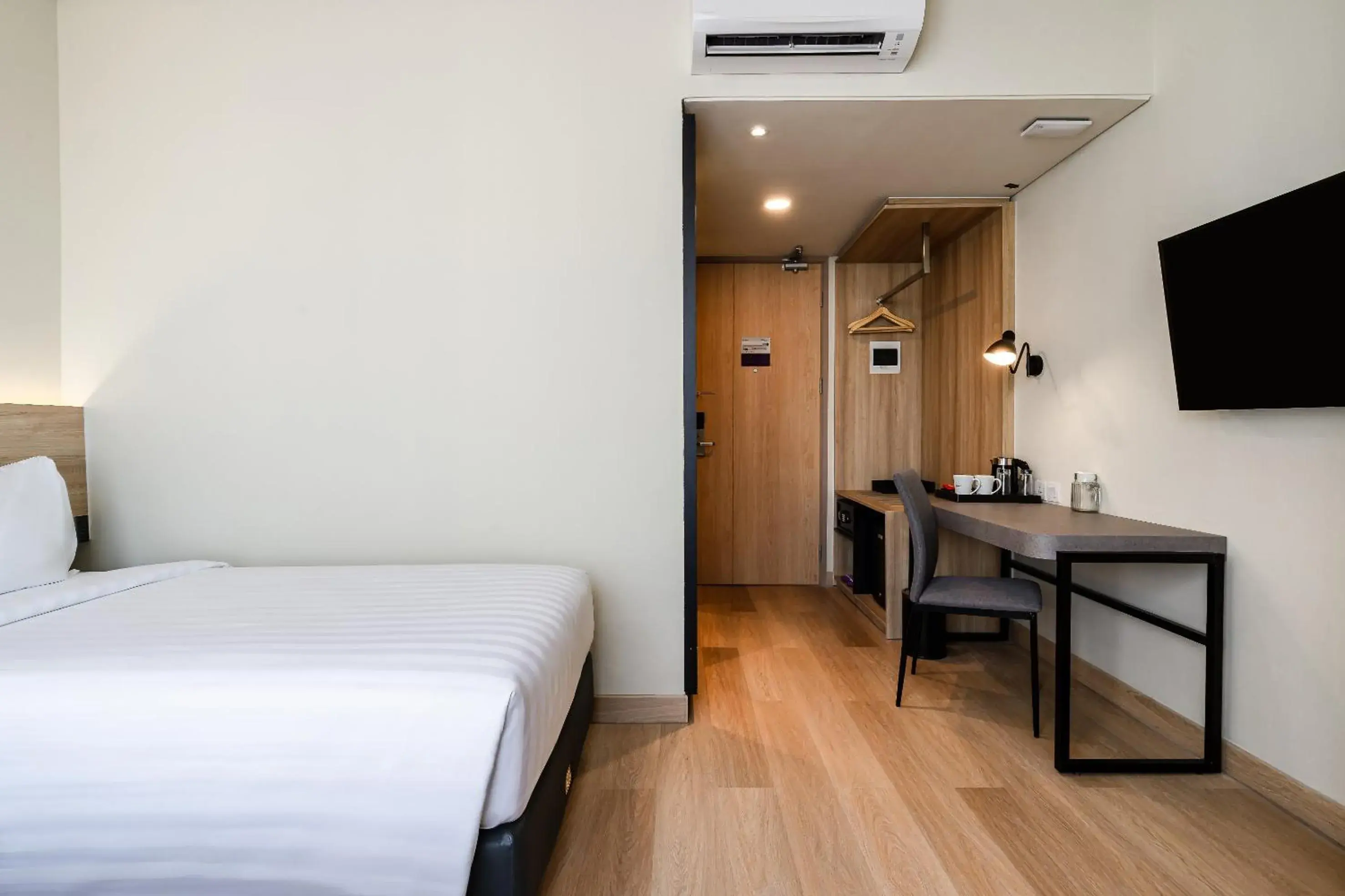 Photo of the whole room, Bed in Quest Prime Pemuda - Semarang Photo of the whole room, Bed in Quest Prime Pemuda - Semarang