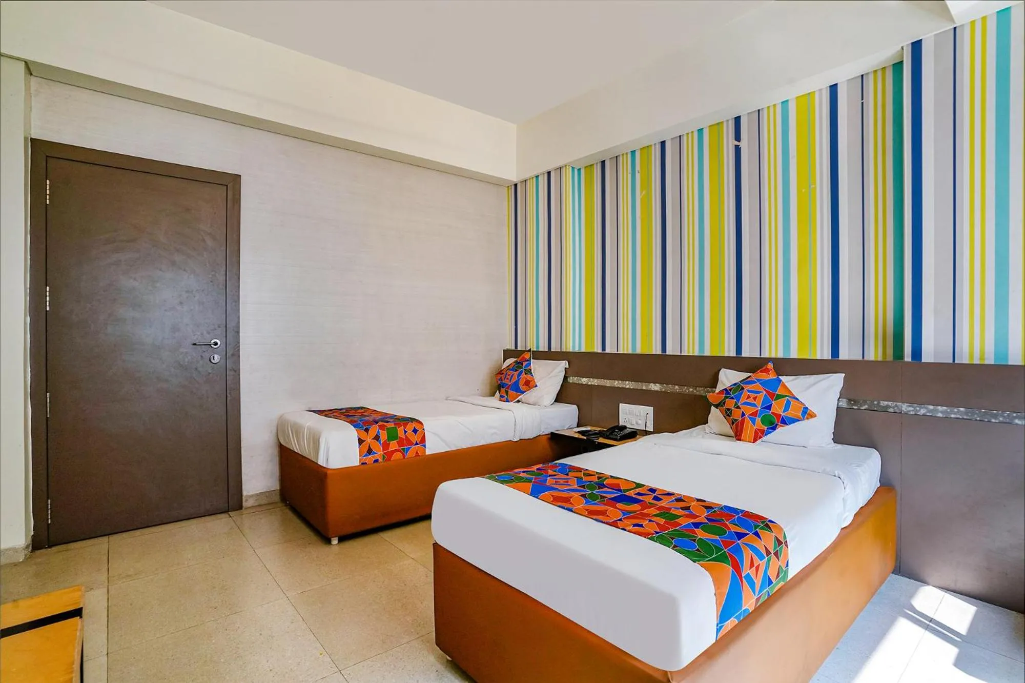 Bed in FabHotel Gargi Deluxe