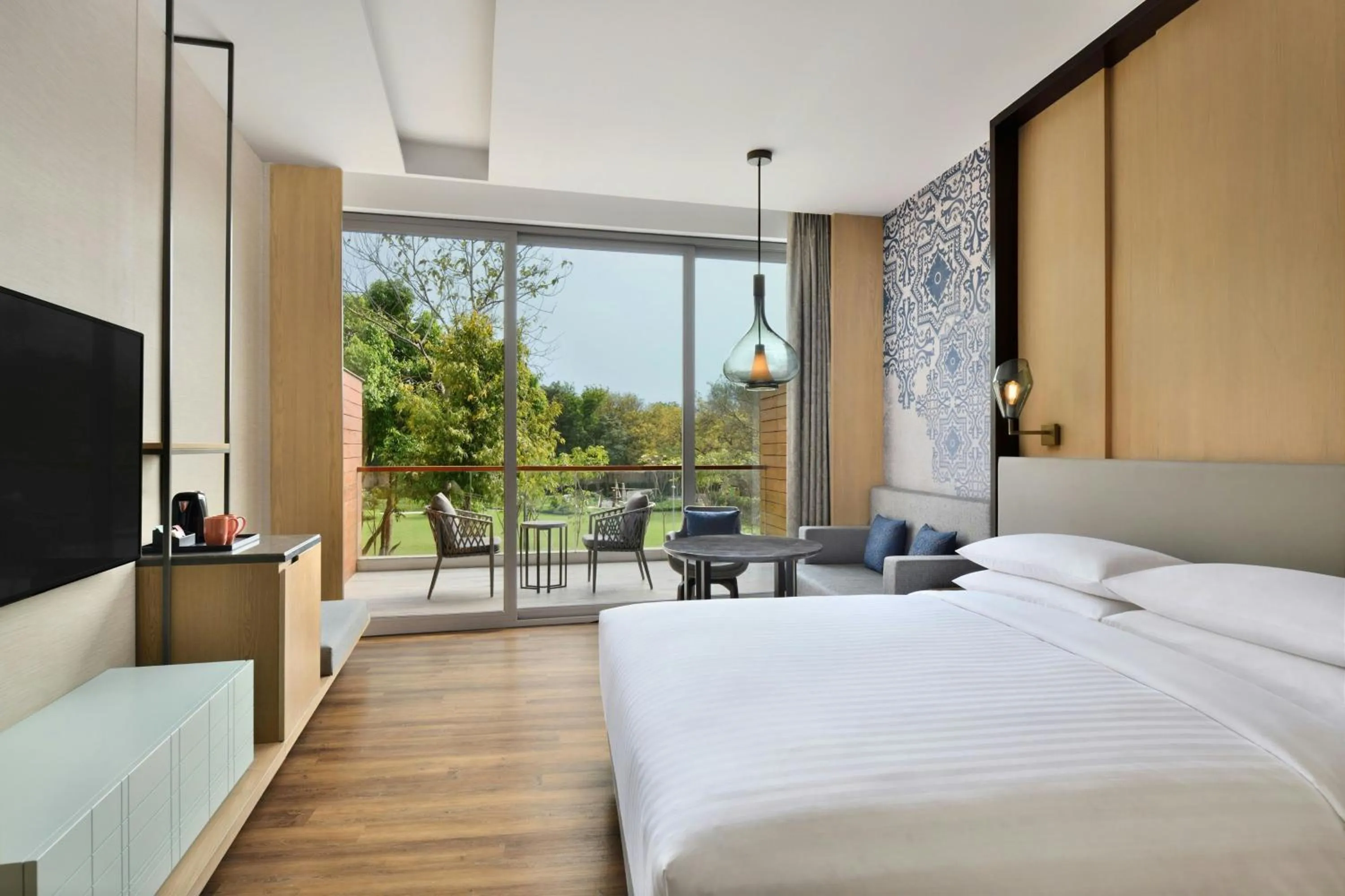 Photo of the whole room, Bed in Courtyard by Marriott Aravali Resort