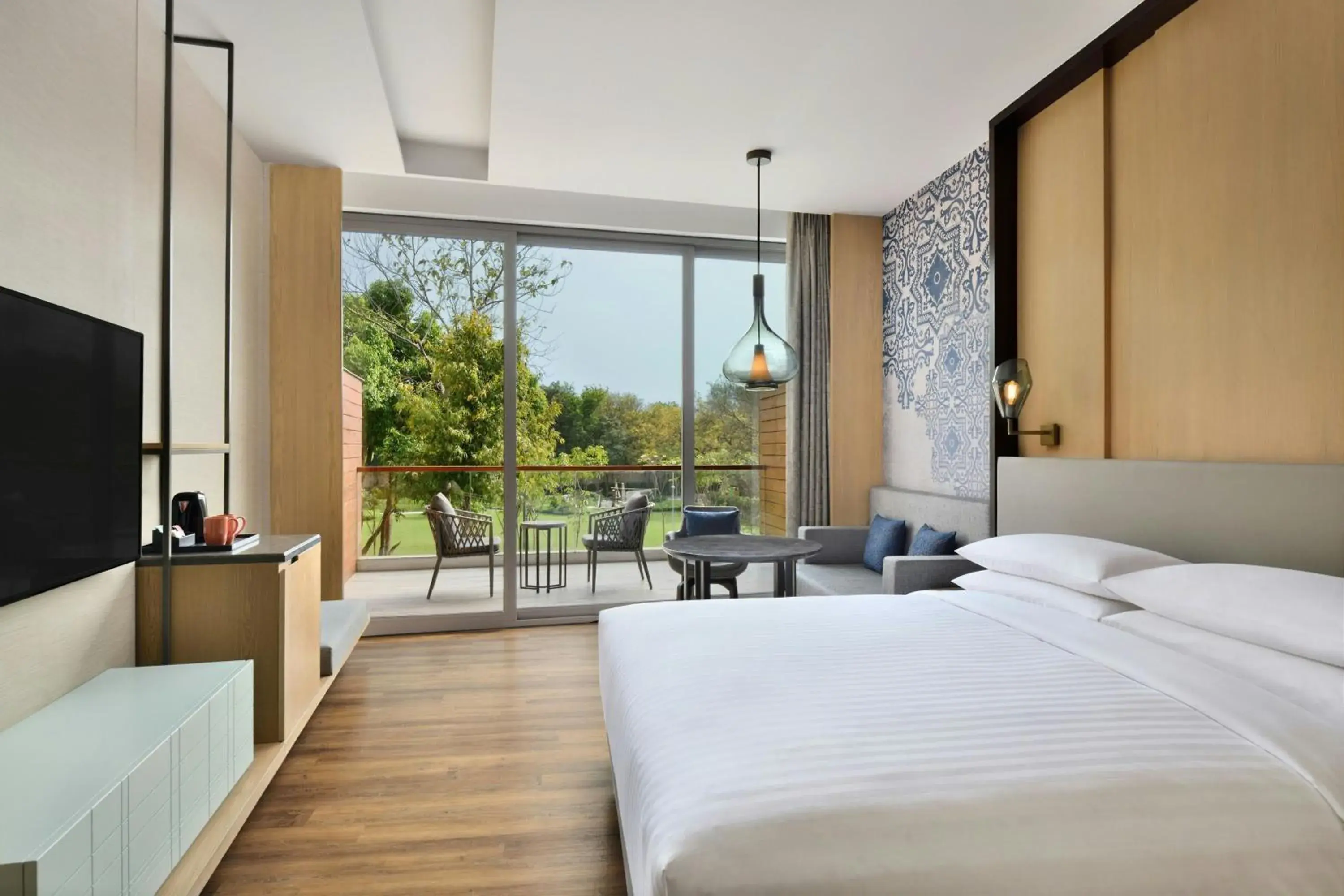 Premium King Room with Sit-Out in Courtyard by Marriott Aravali Resort Premium King Room with Sit-Out in Courtyard by Marriott Aravali Resort