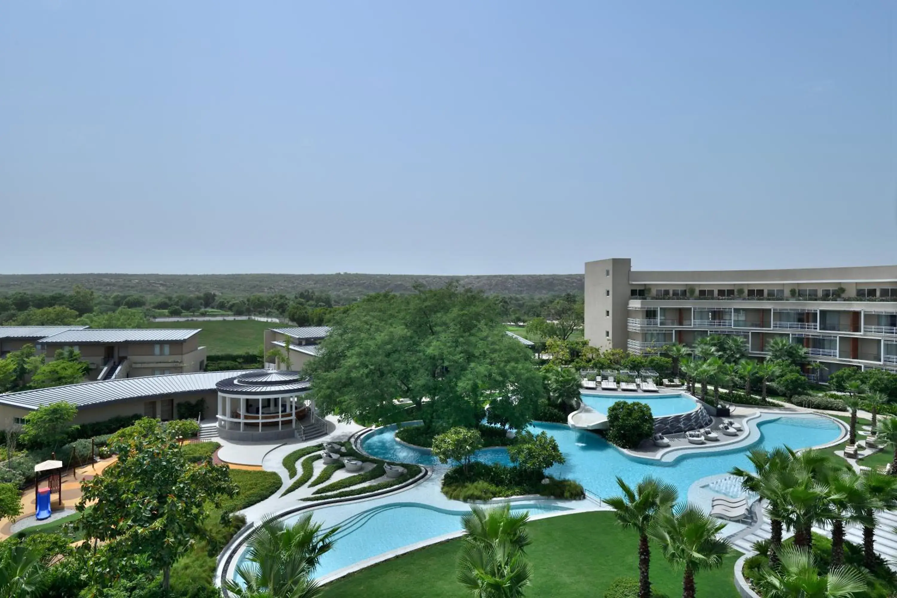 Deluxe Guest room, King, Pool view, Balcony in Courtyard by Marriott Aravali Resort Deluxe Guest room, King, Pool view, Balcony in Courtyard by Marriott Aravali Resort