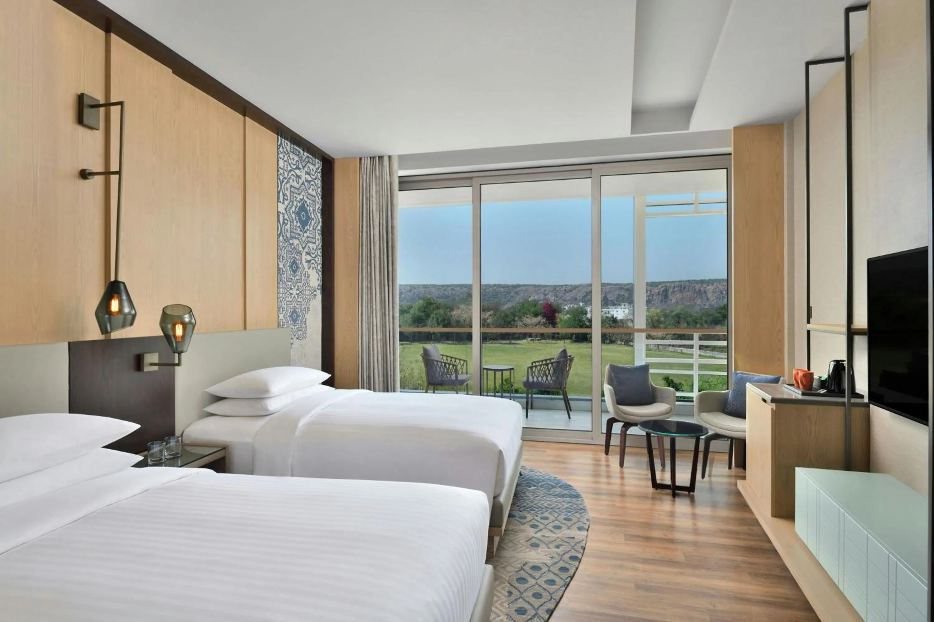 Photo of the whole room, Bed in Courtyard by Marriott Aravali Resort