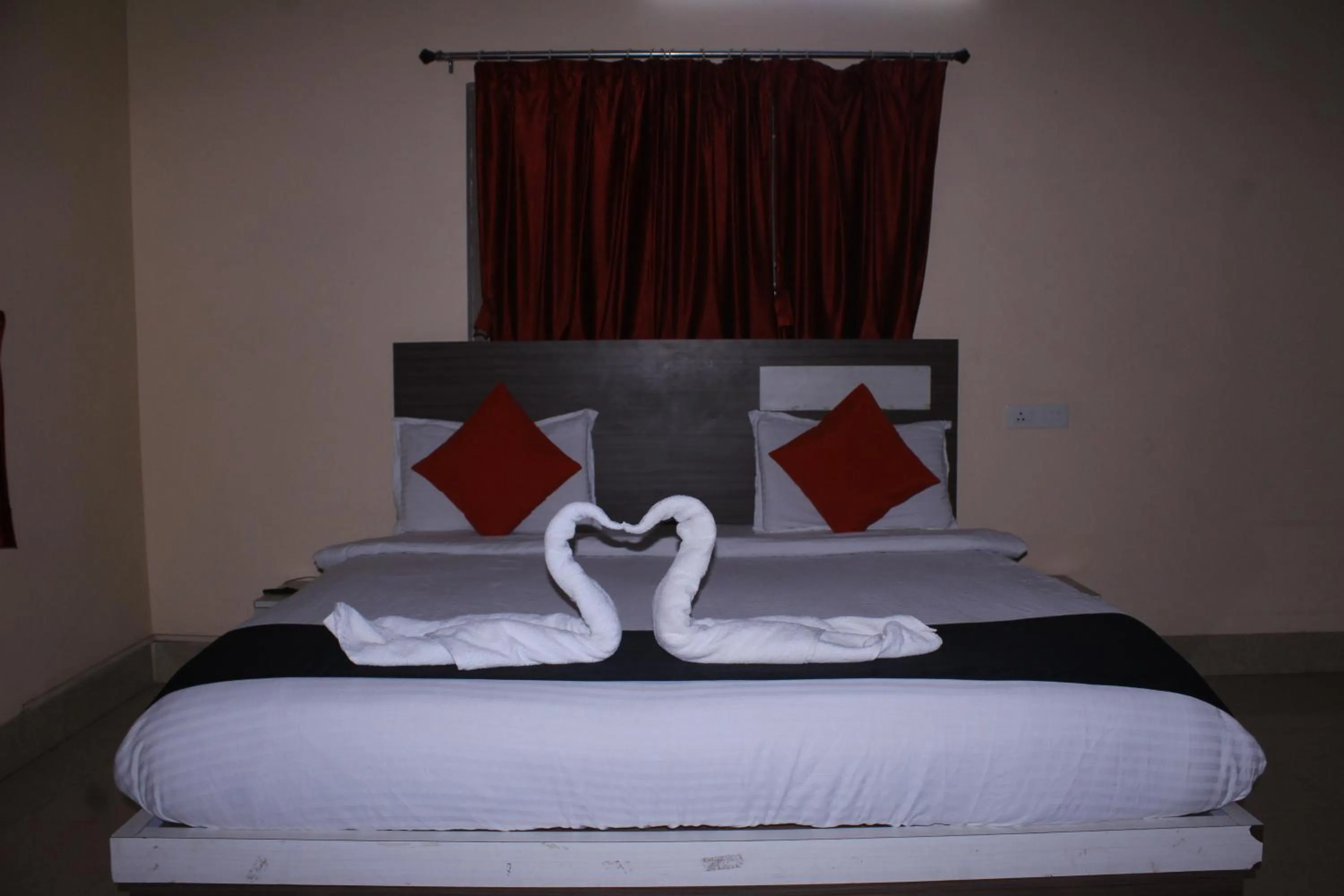 Bed in CHETAN INN HOTEL