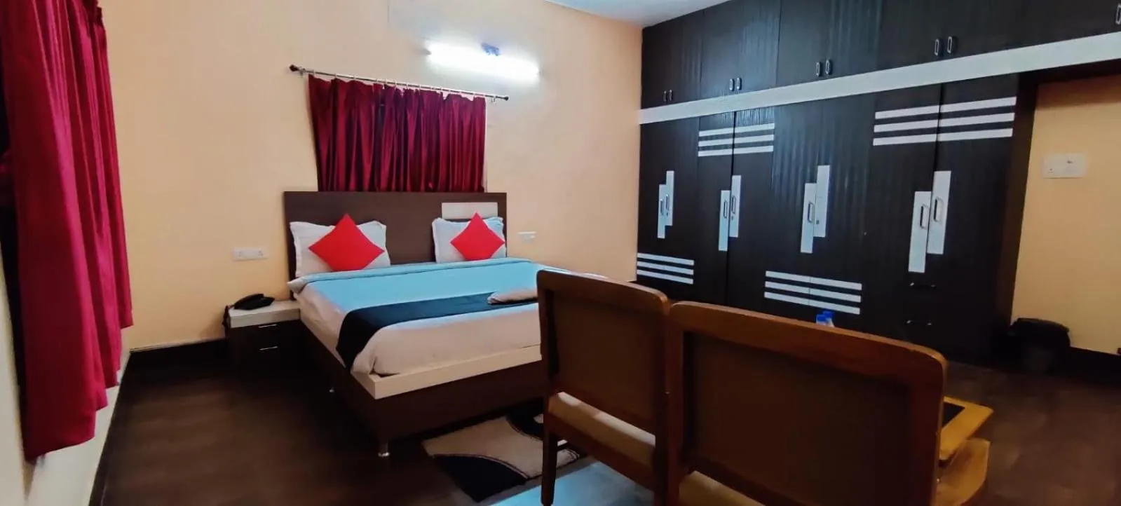 Bed in CHETAN INN HOTEL
