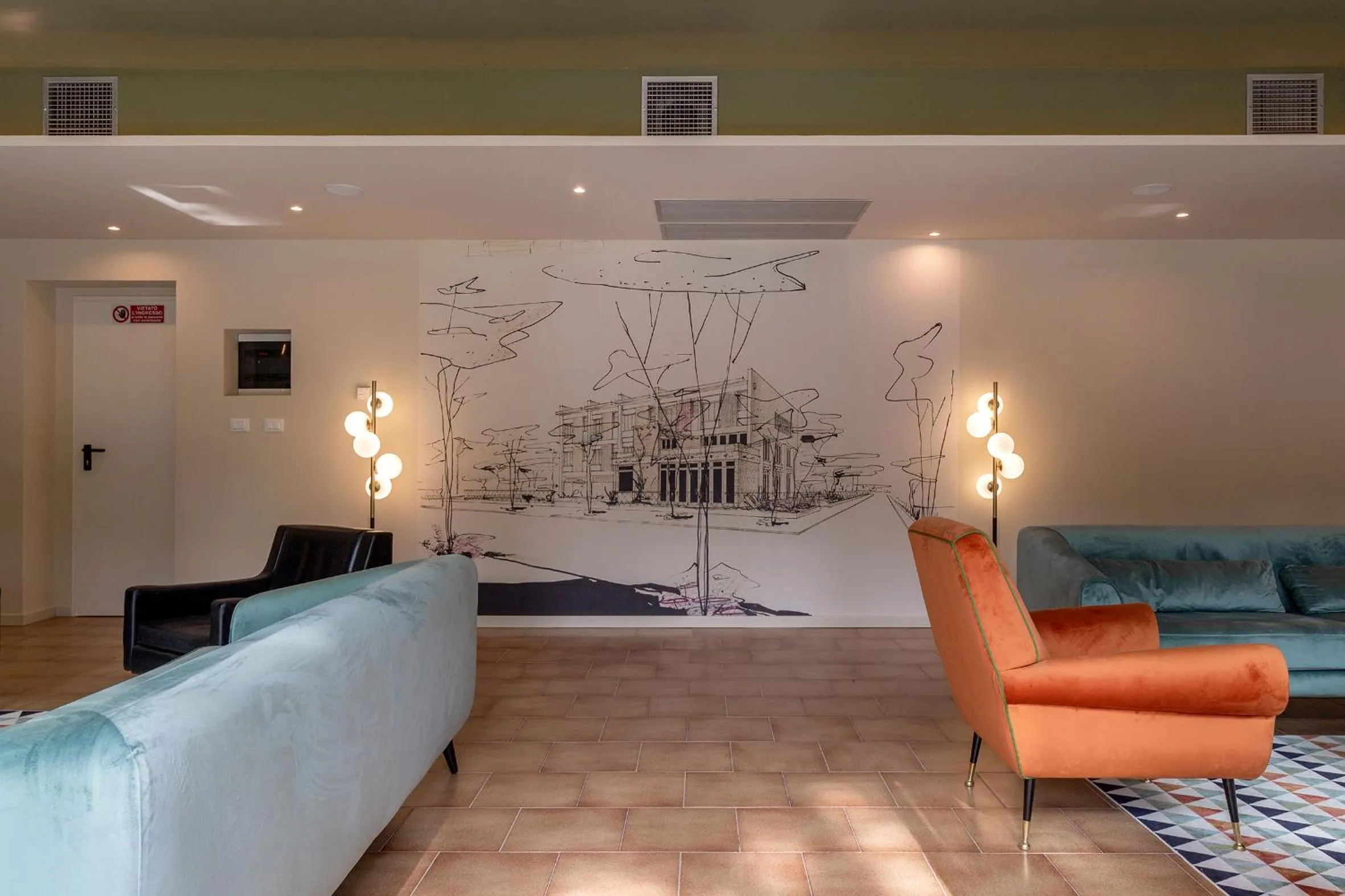 Communal lounge/ TV room in Hotel Millepini