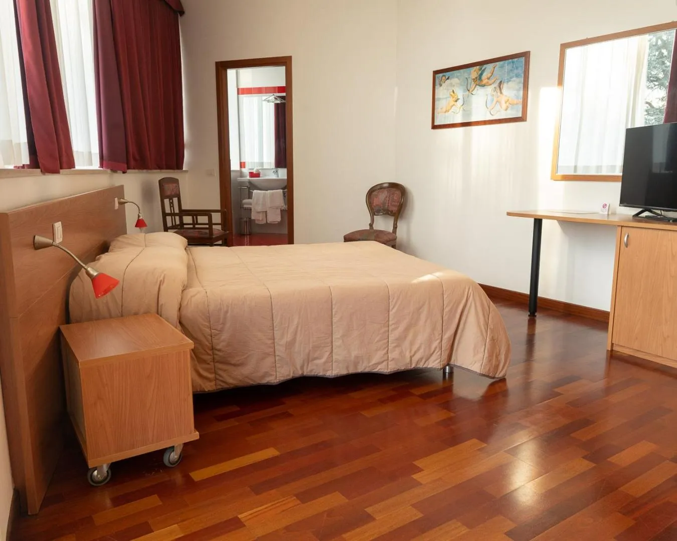 Communal lounge/ TV room, Bed in Hotel all'Oasi