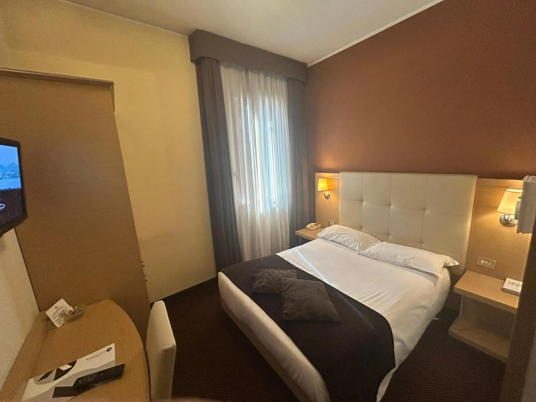 Bed in Hotel Vittoria