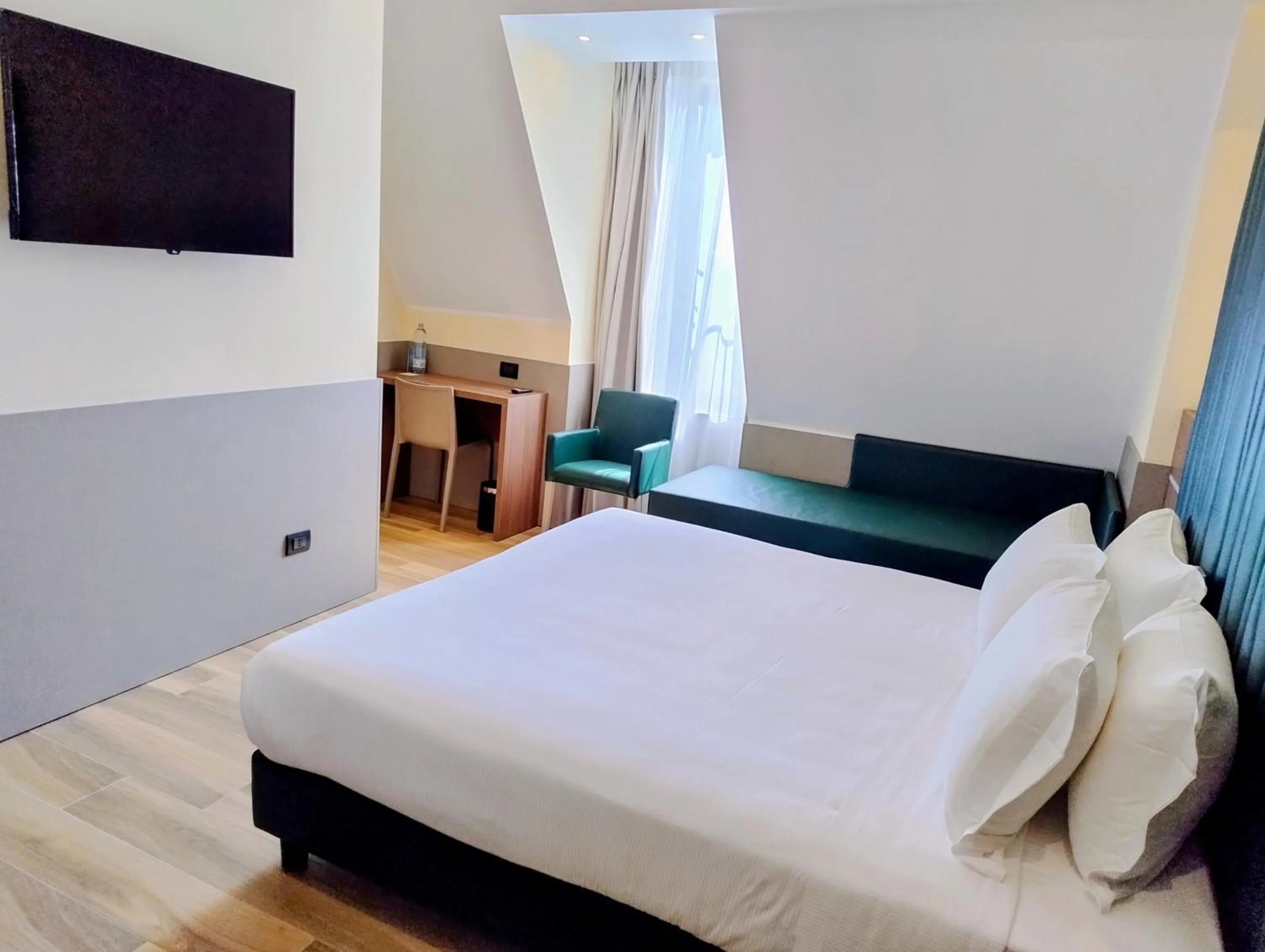 Photo of the whole room, Bed in JR Hotels Bocconi Milano