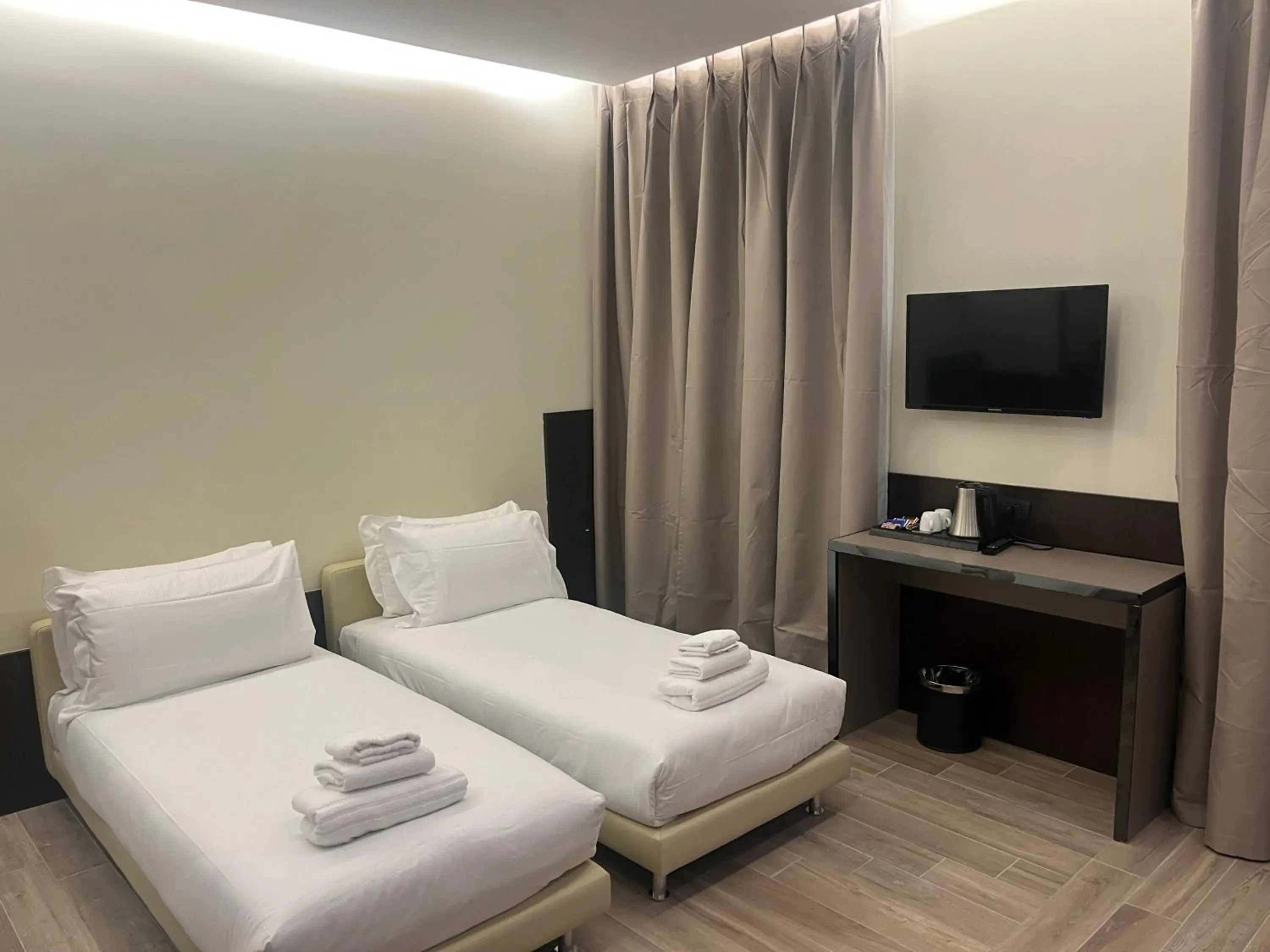 Photo of the whole room, Bed in JR Hotels Bocconi Milano Photo of the whole room, Bed in JR Hotels Bocconi Milano