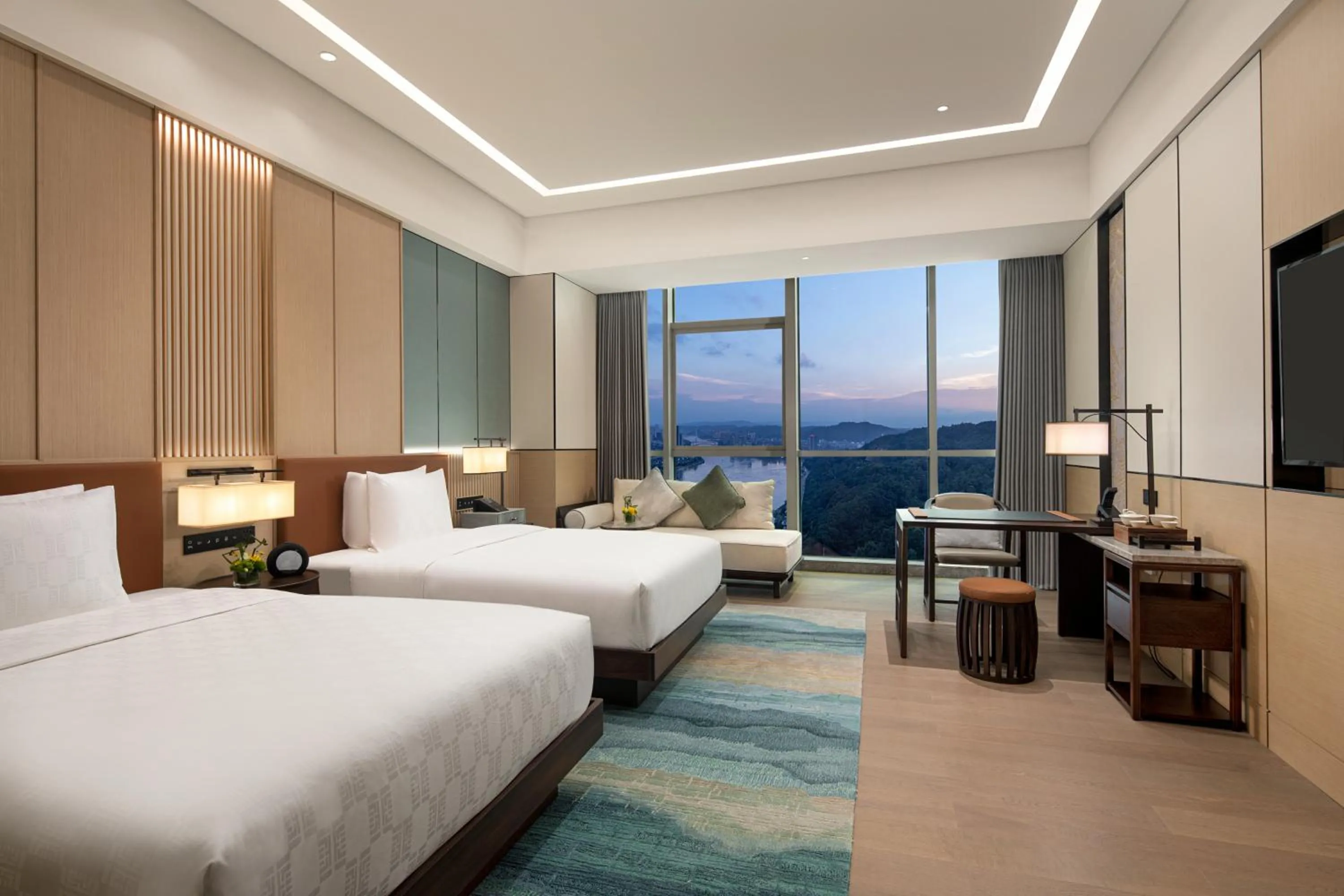 Bed in HUALUXE Yibin