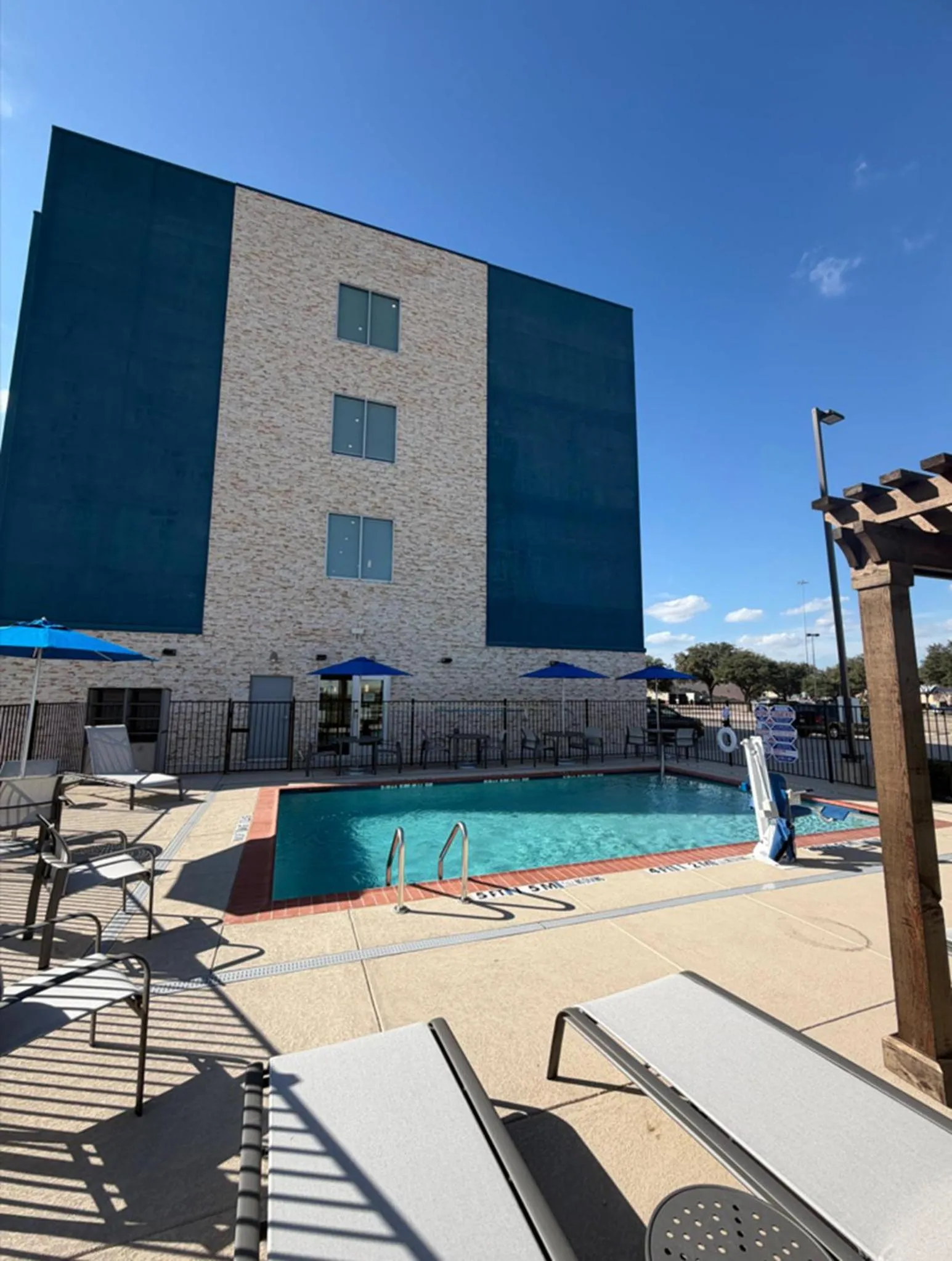 Swimming pool in HOLIDAY INN EXPRESS & SUITES DALLAS PLANO NORTH by IHG
