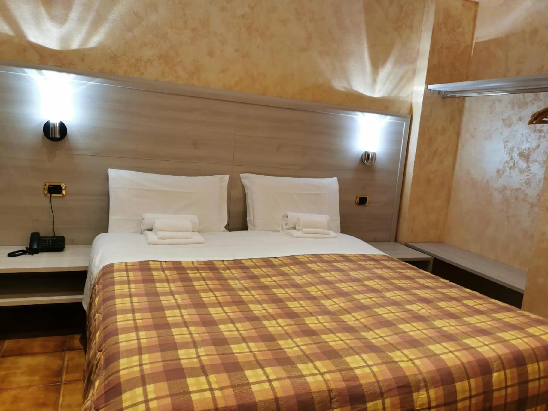 Bed in Hotel Orchidea