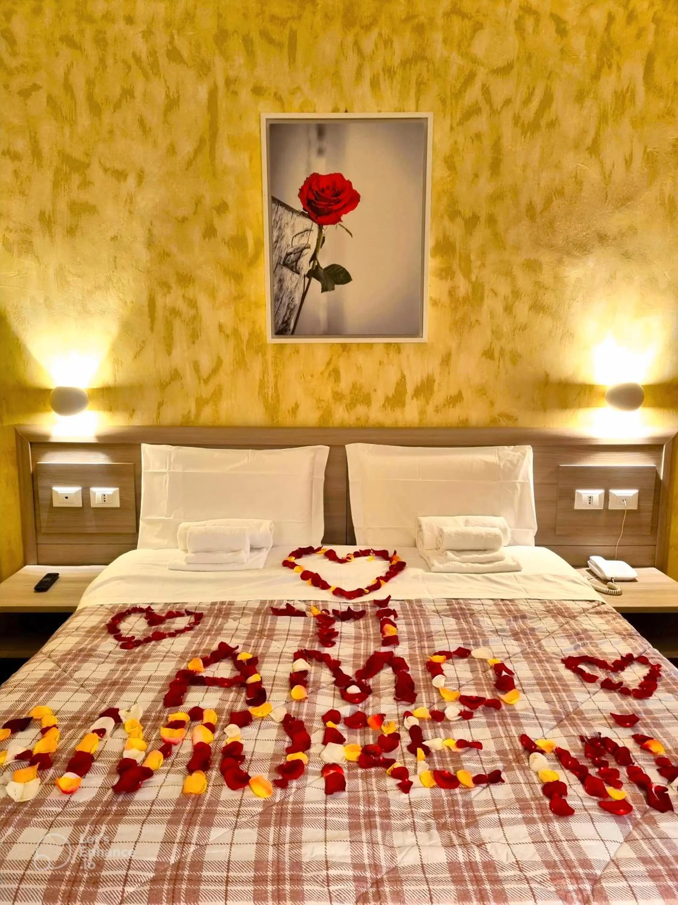 Bed in Hotel Orchidea