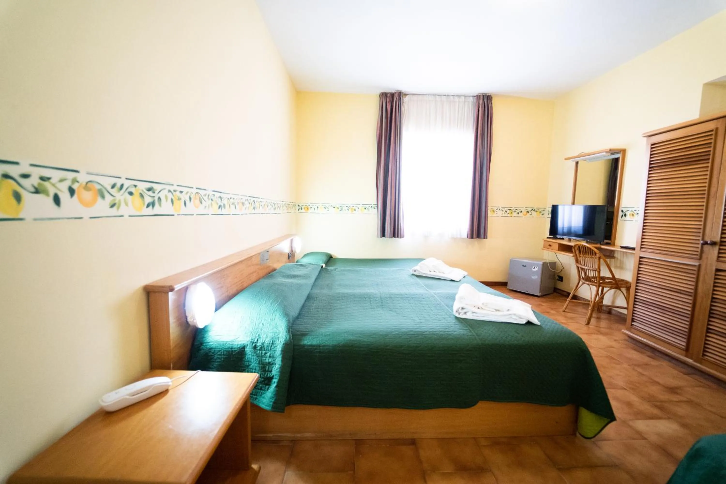 Bed in Hotel San Pietro