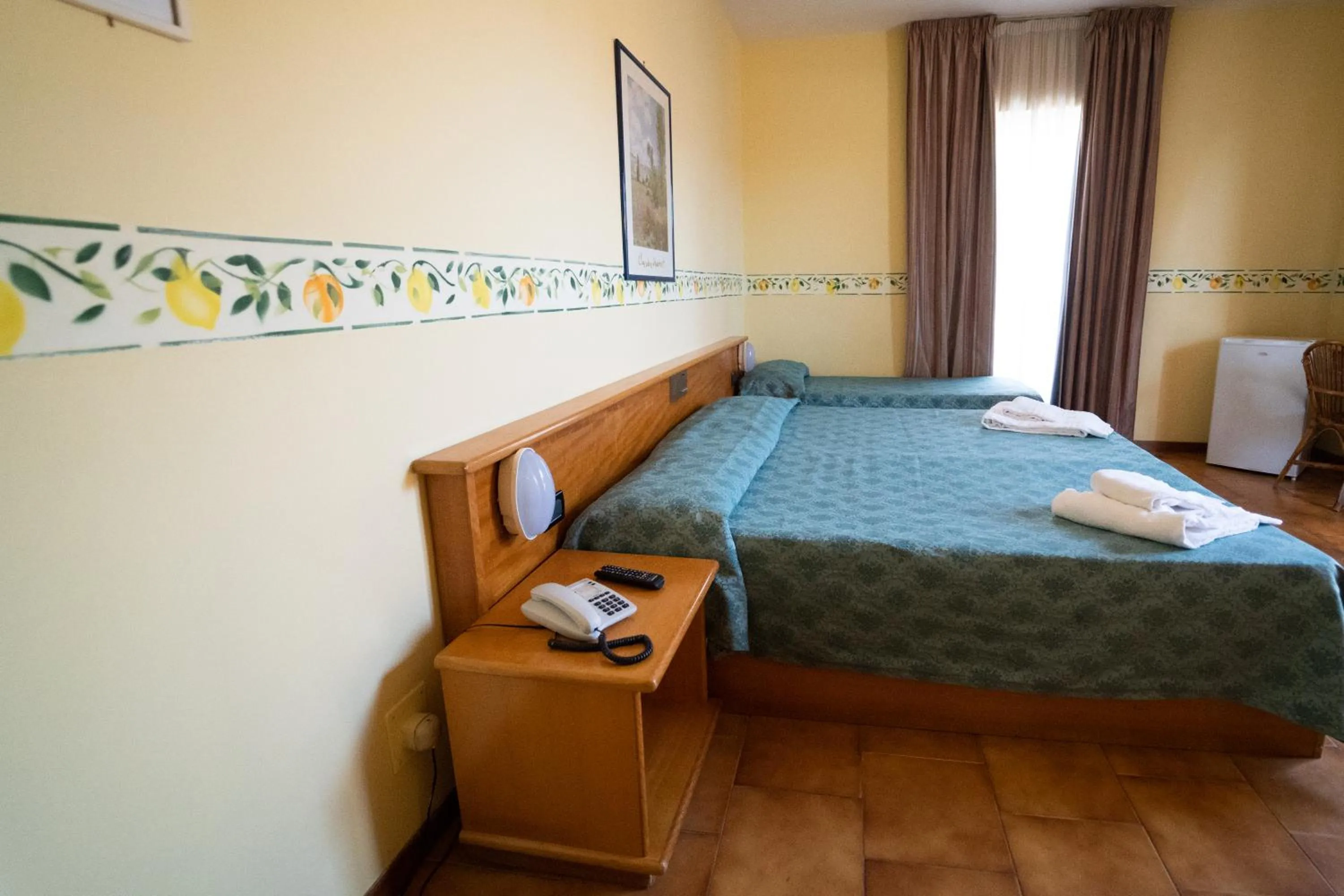 Bed in Hotel San Pietro