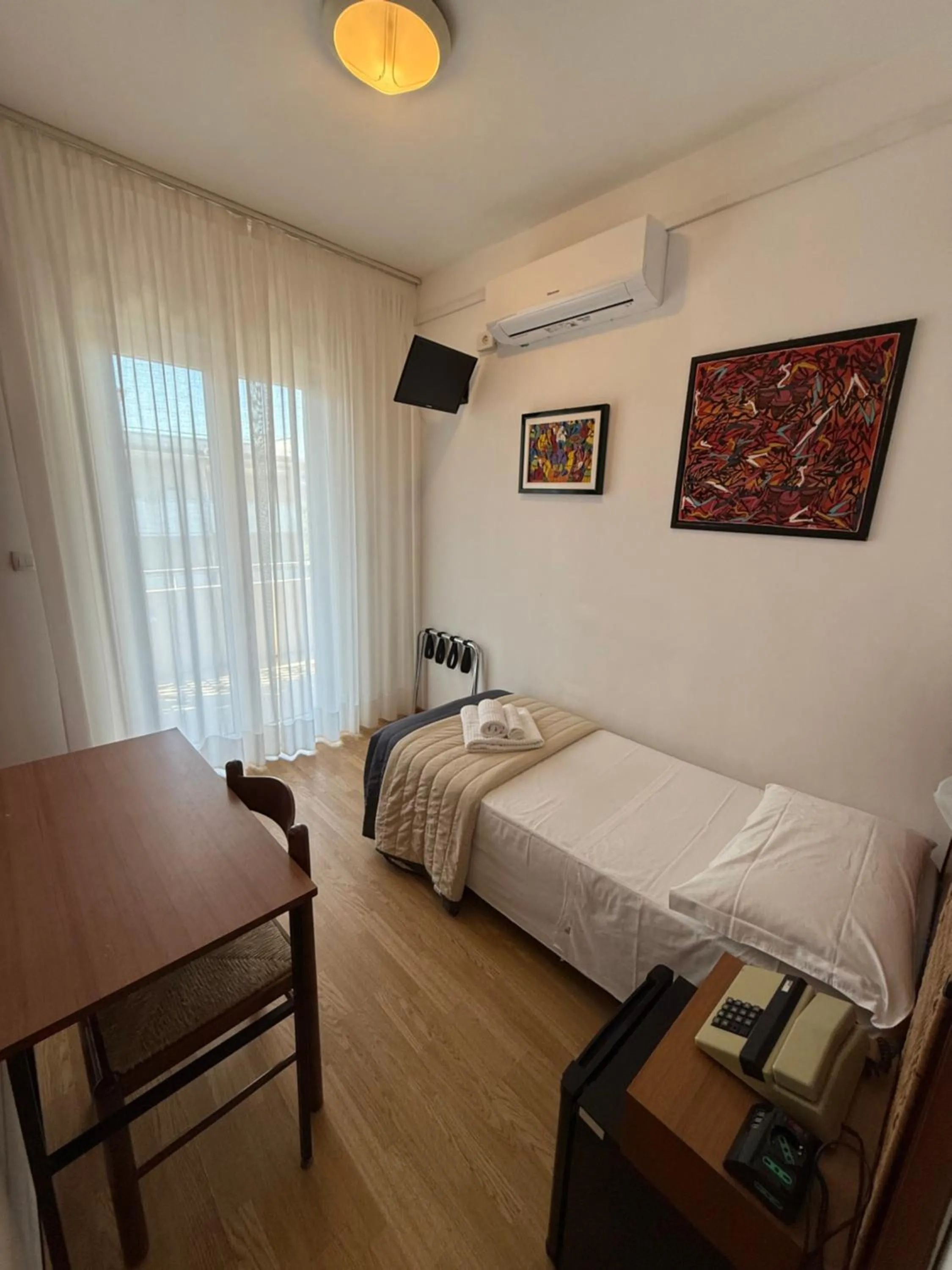 air conditioner, Bed in Hotel Helvetia