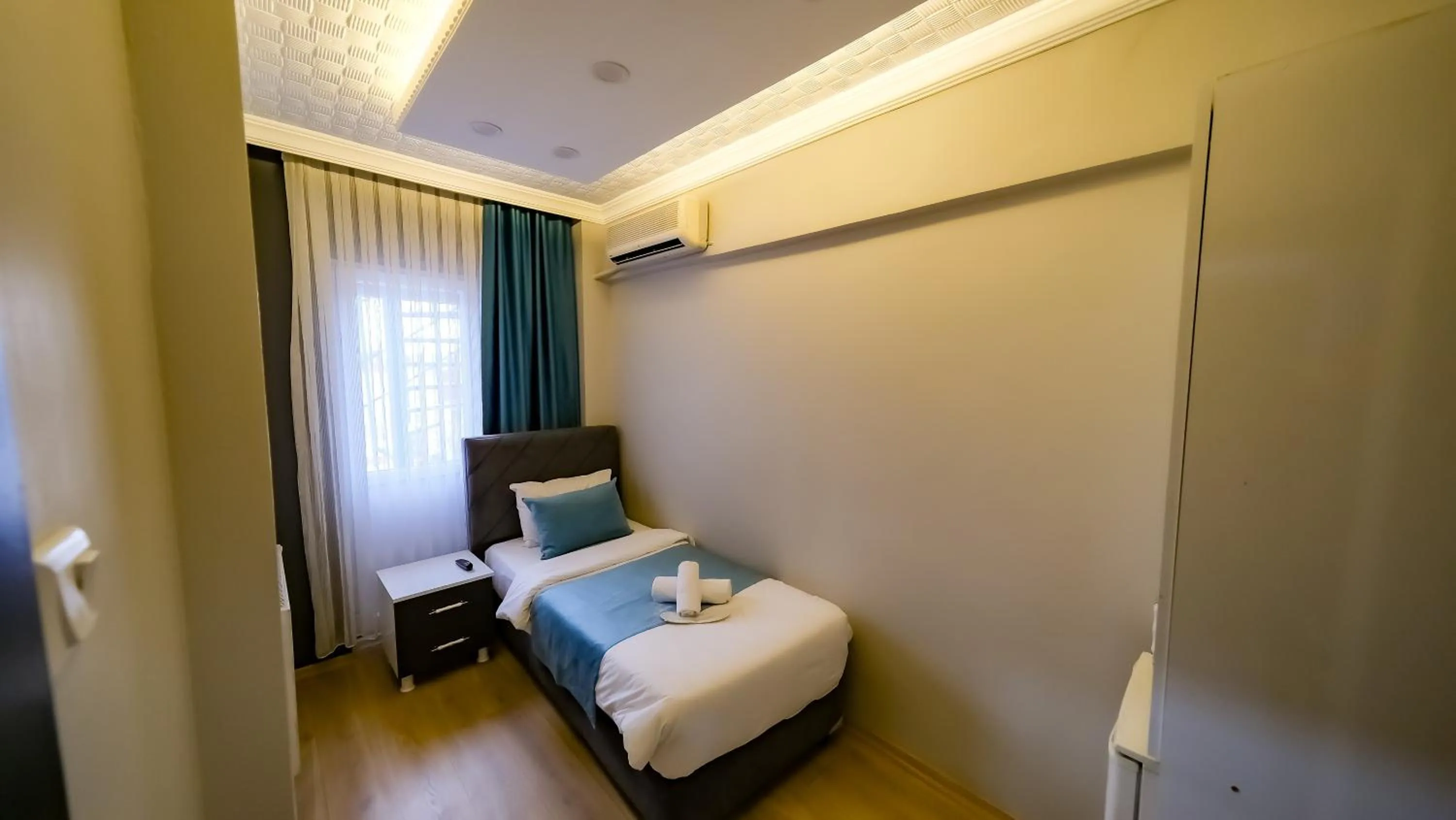 Bed in Bona Sera Hotel