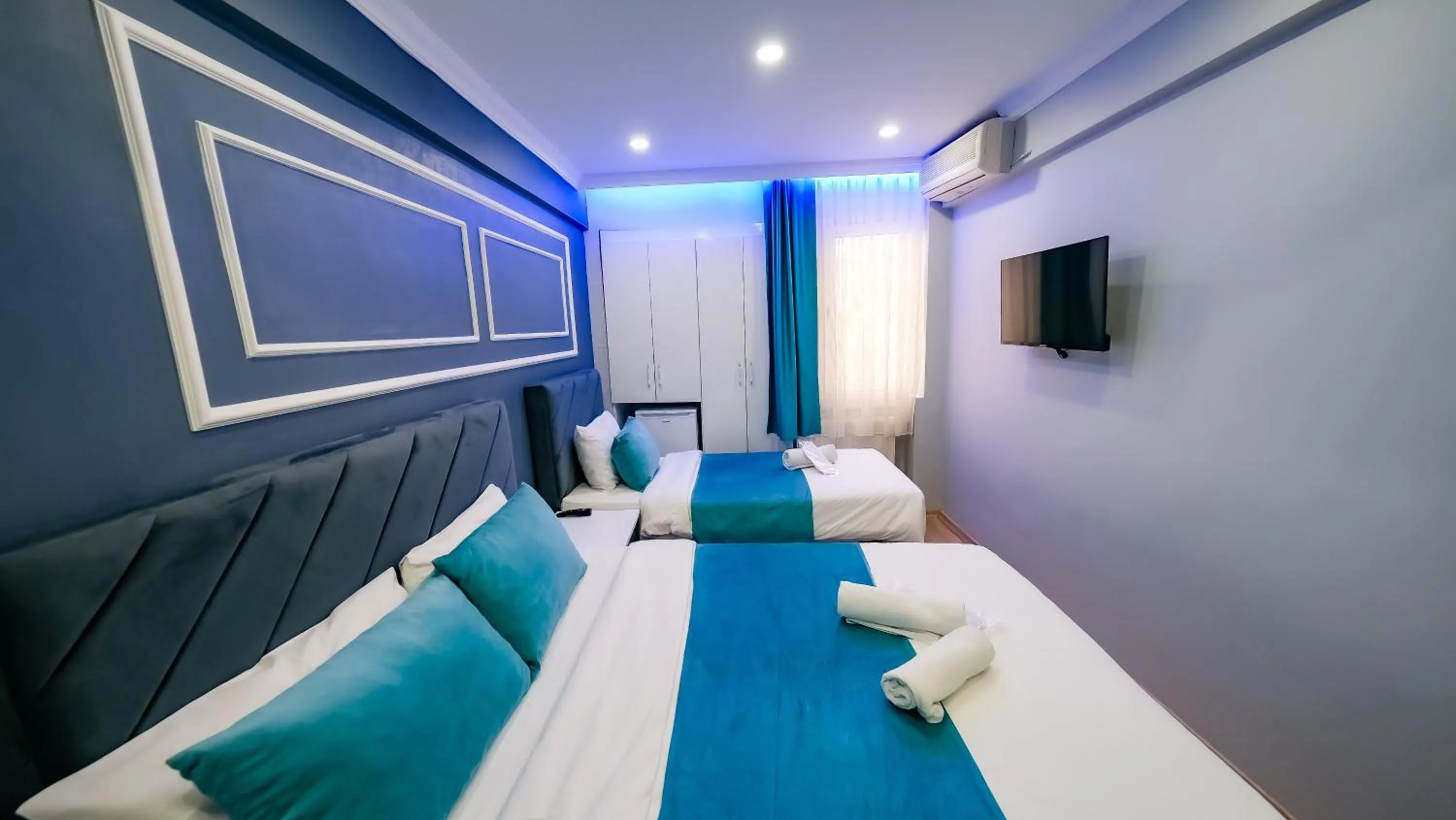 Bed in Bona Sera Hotel